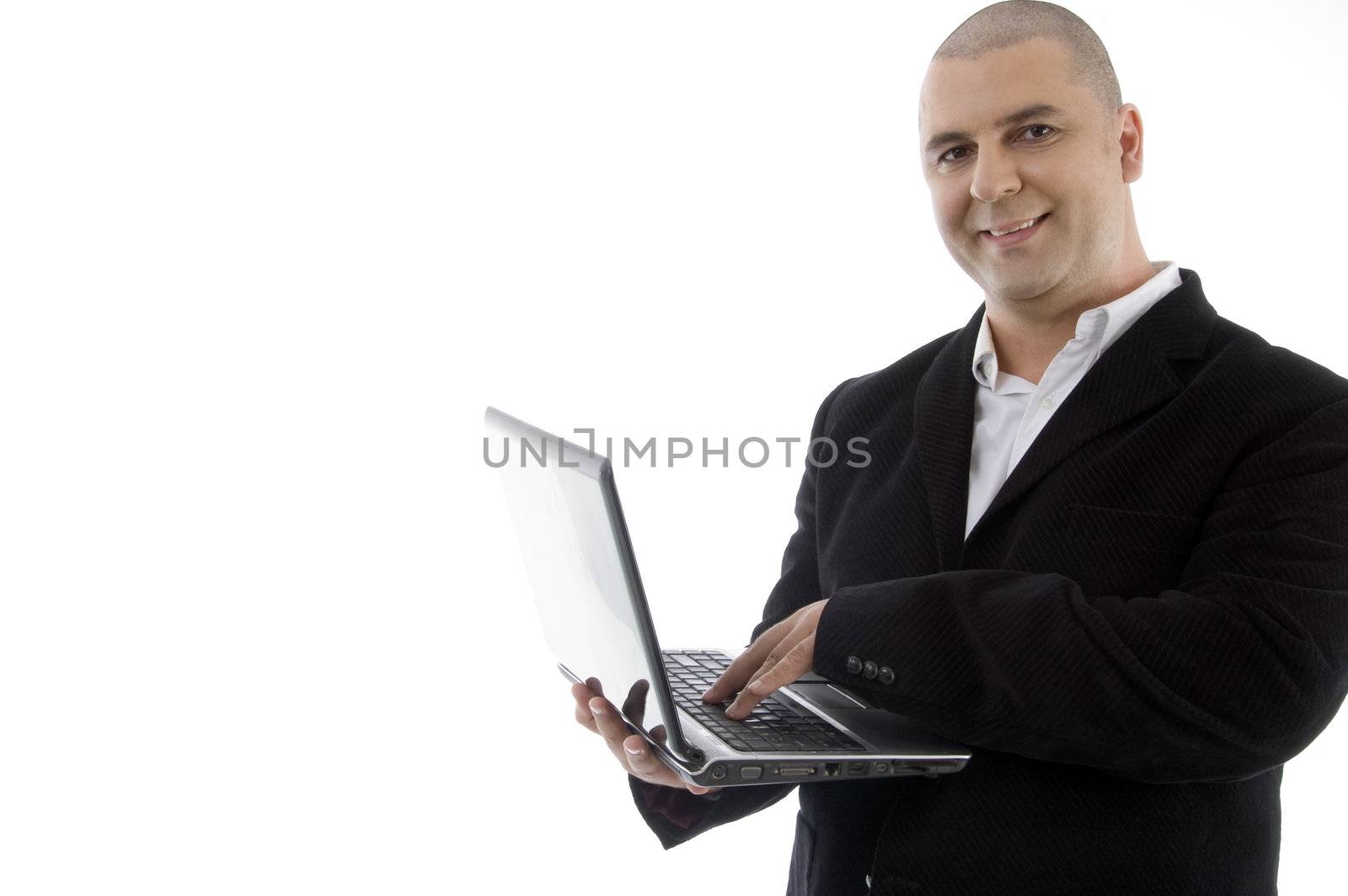 successful executive busy with laptop on an isolated background