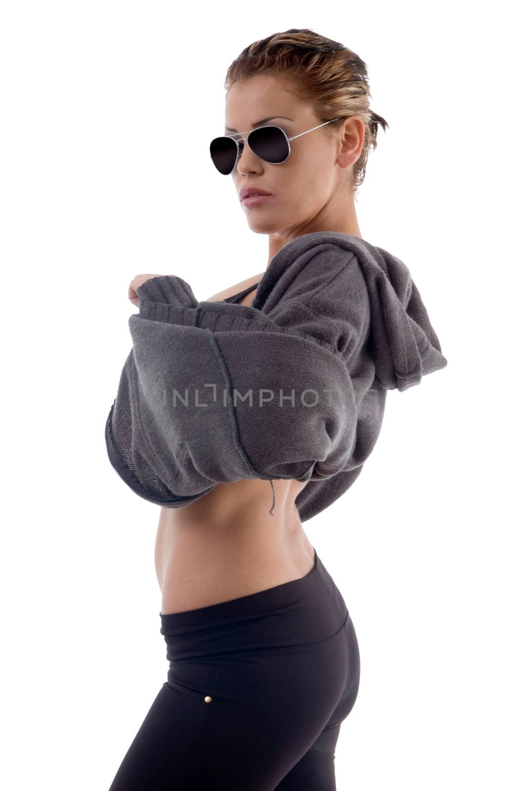 fashionable sexy woman posing in front of camera on an isolated background