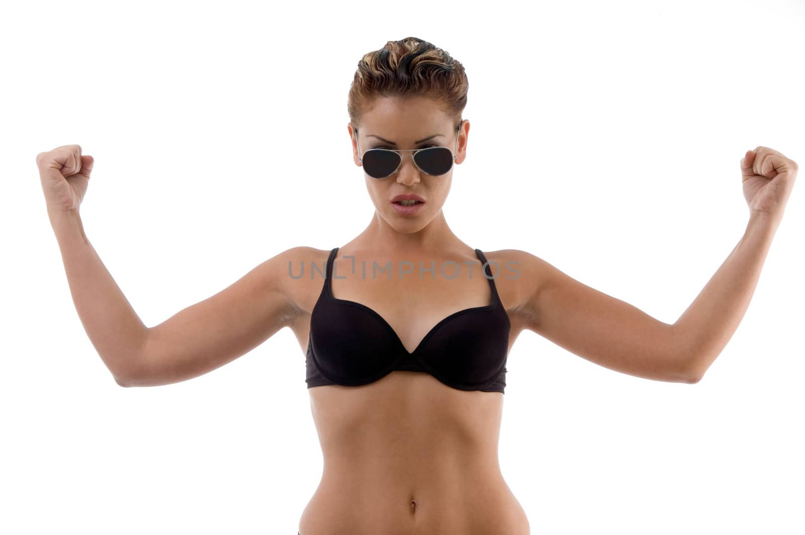 sexy woman showing her muscles with white background