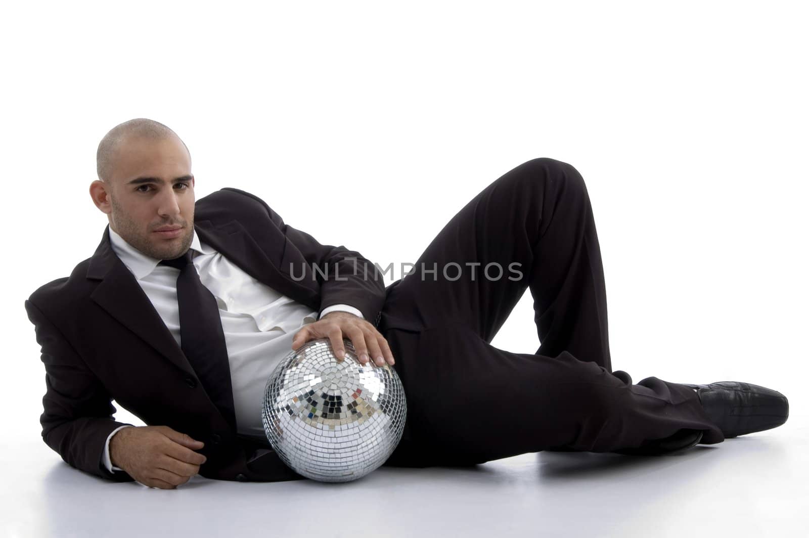 young accountant posing with disco ball against white background