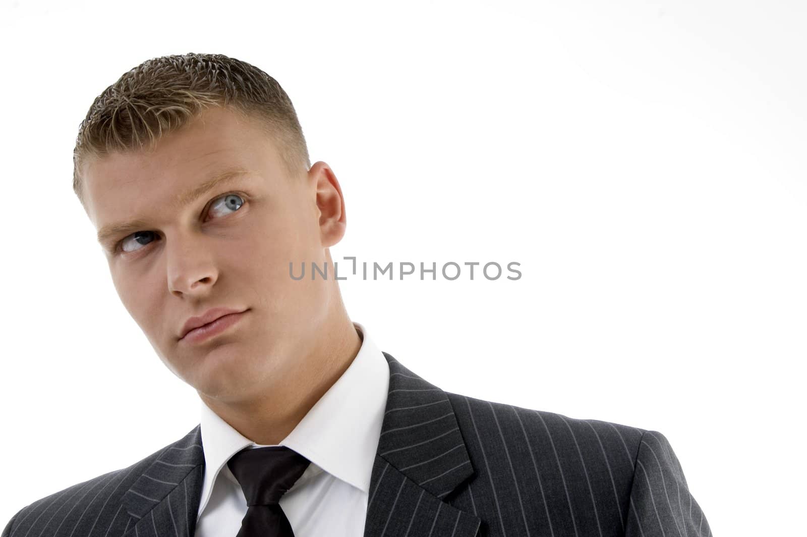 close up of handsome businessman looking upward on an isolated white background