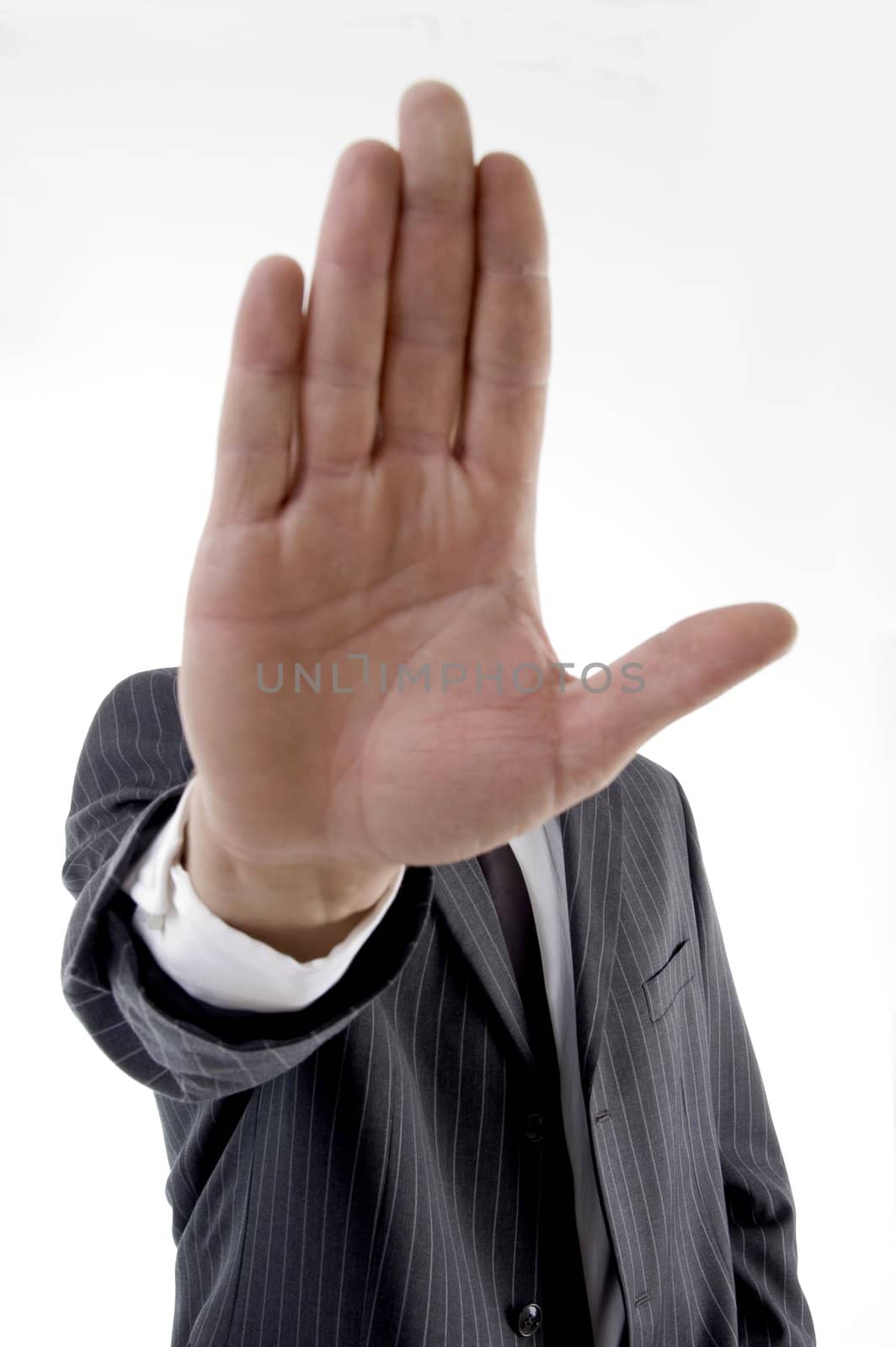 young man showing stopping gesture on an isolated background