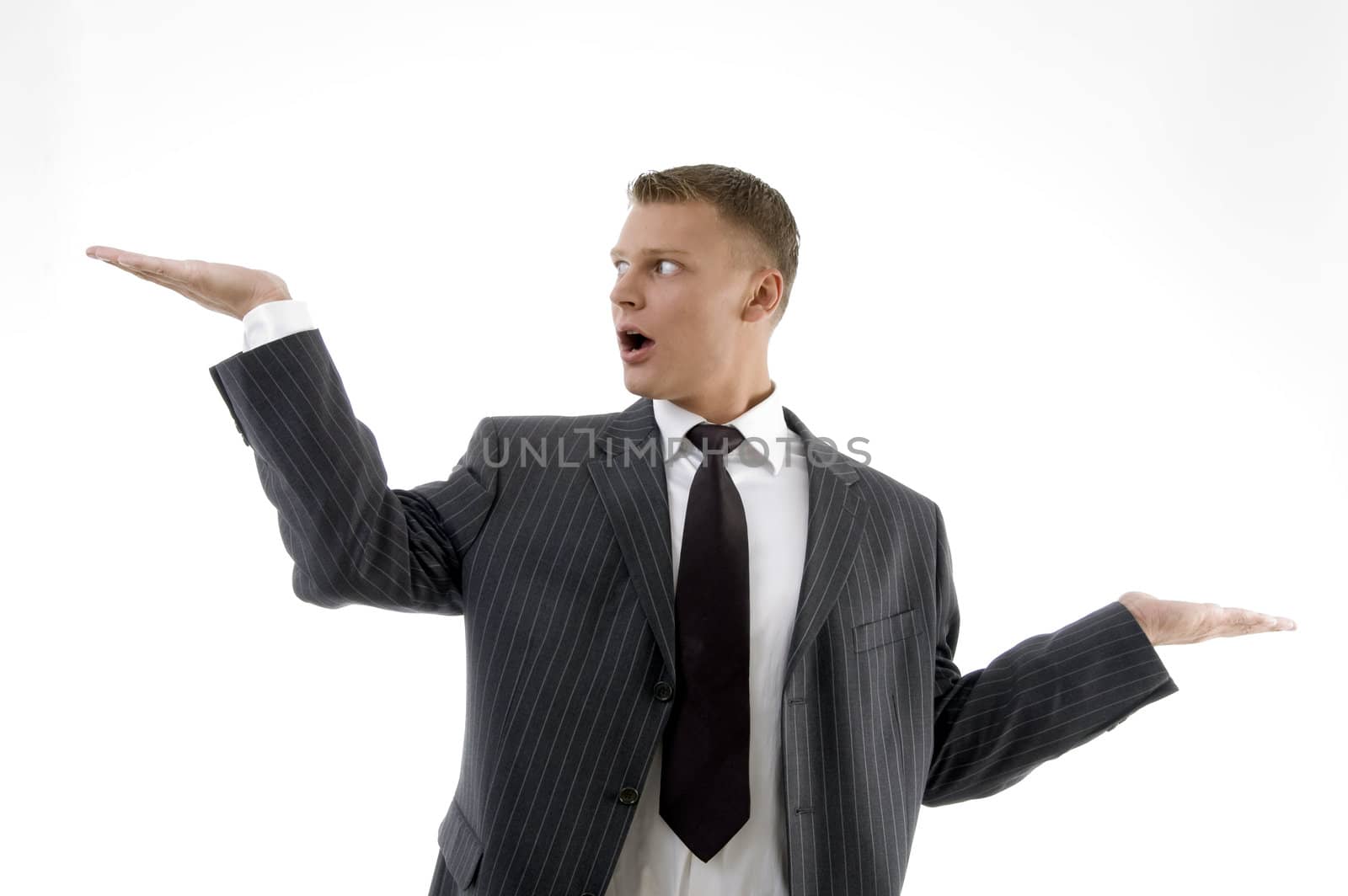 adult handsome man showing hand gesture on an isolated white background