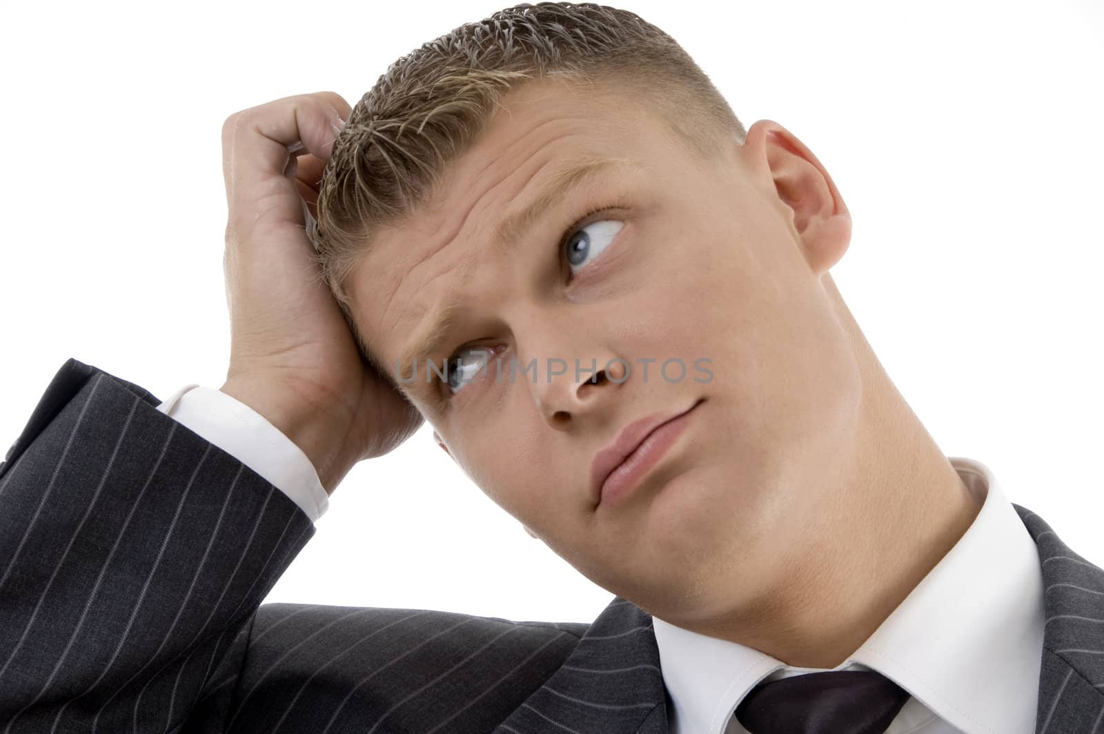 portrait of confused businessman with white background