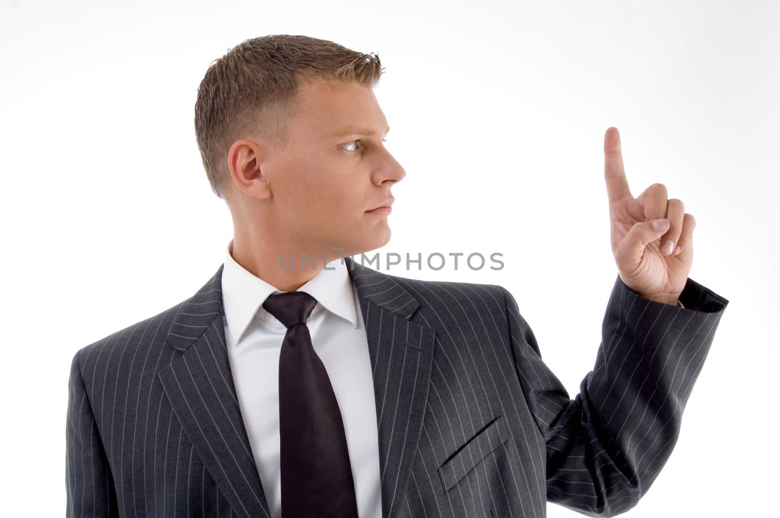 portrait of young professional looking his finger on an isolated white background