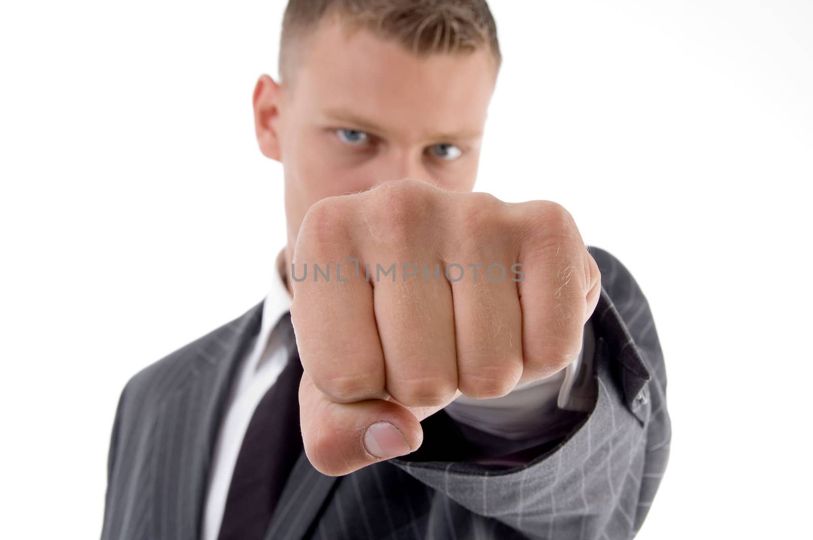 businessman showing punch on an isolated white background