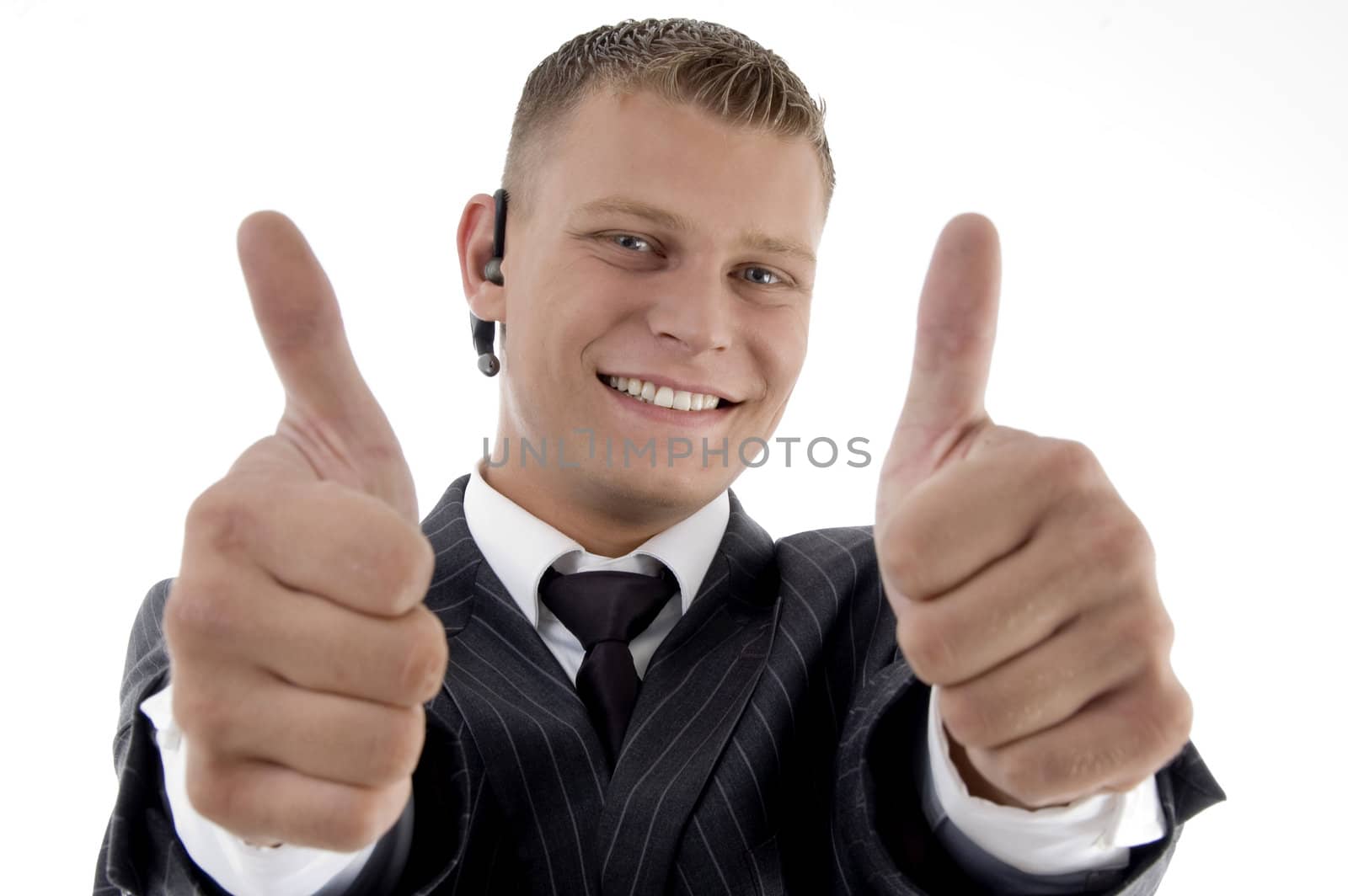 successful executive with thumbs up hand gesture on an isolated background