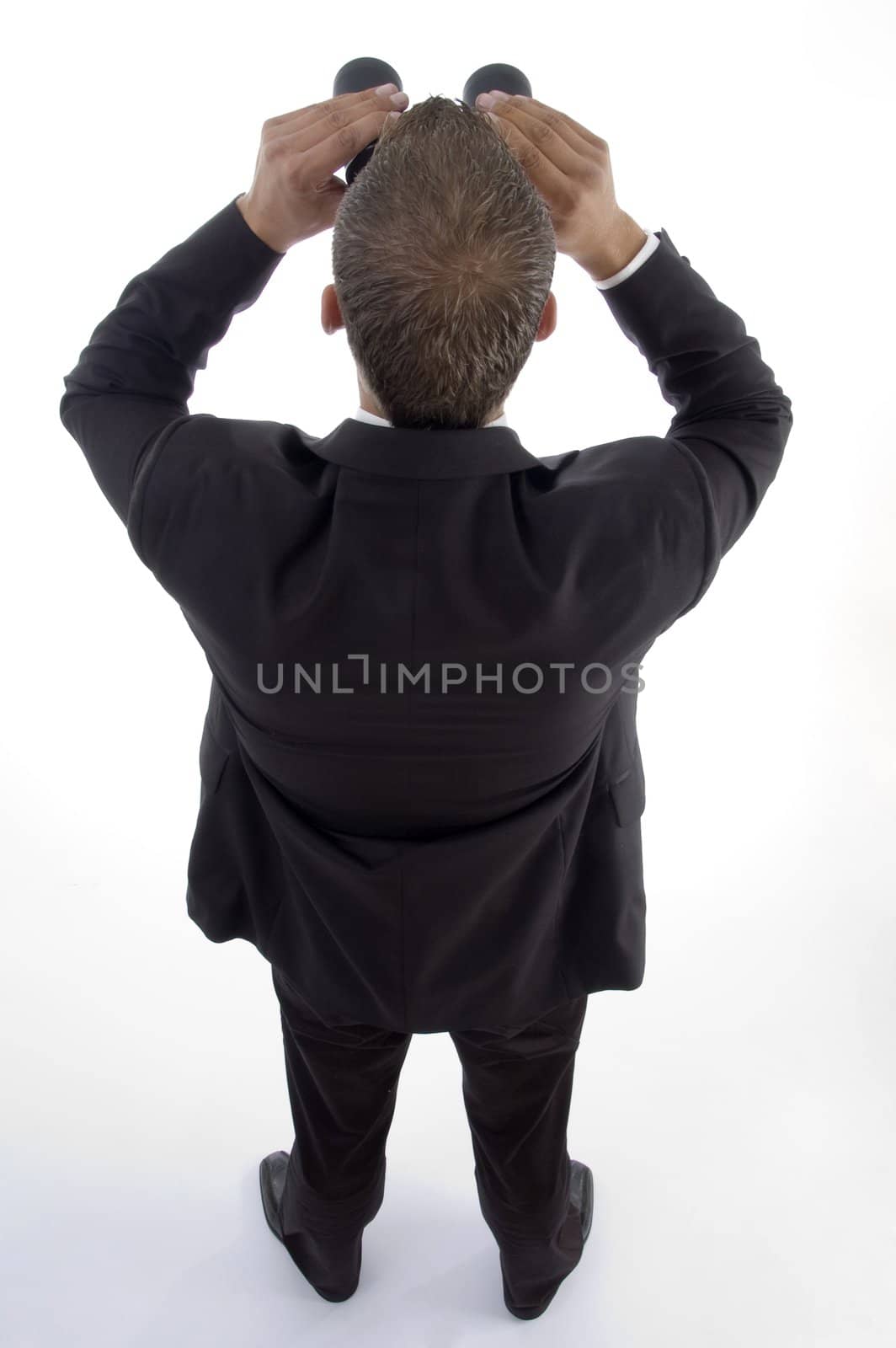 smart young lawyer viewing through binoculars on an isolated white background
