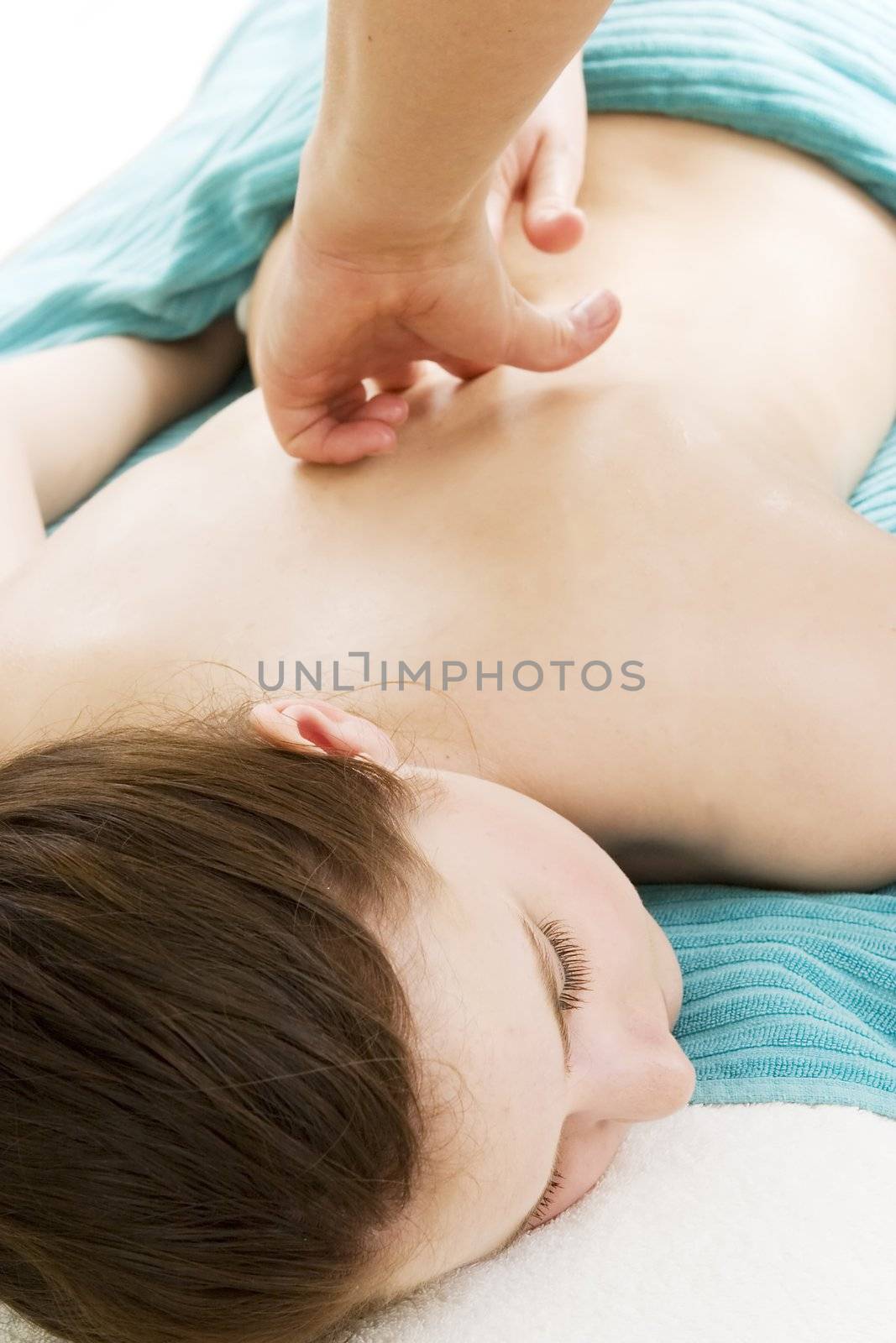 Detail image of a back massage at a beauty spa.