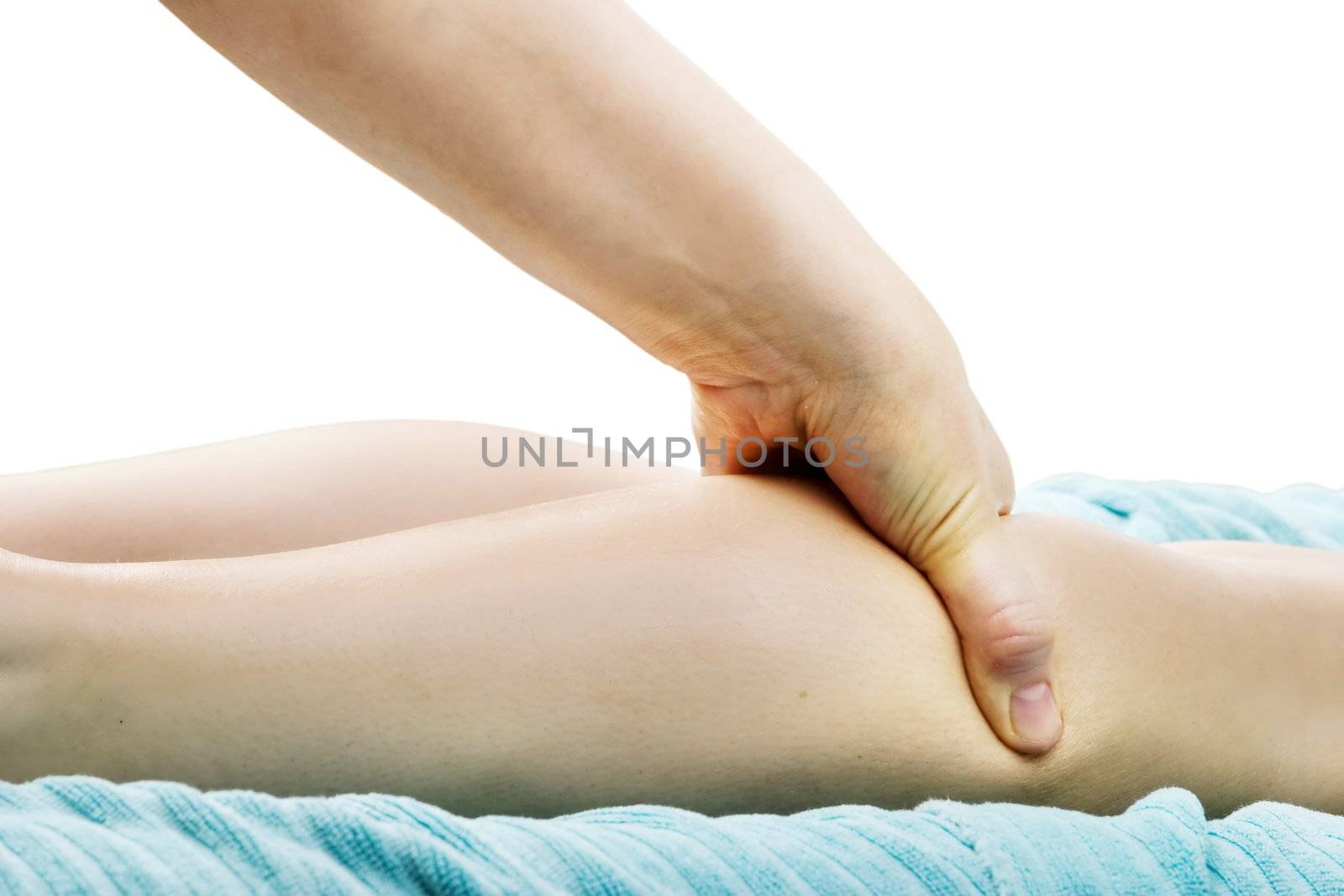 A detail image of a female leg being massaged.