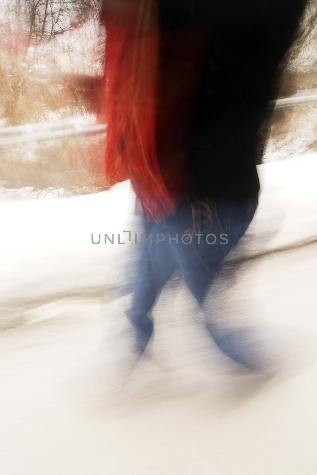 A motion blur abstract of a person walking in a hurry, a late rushing concept image.