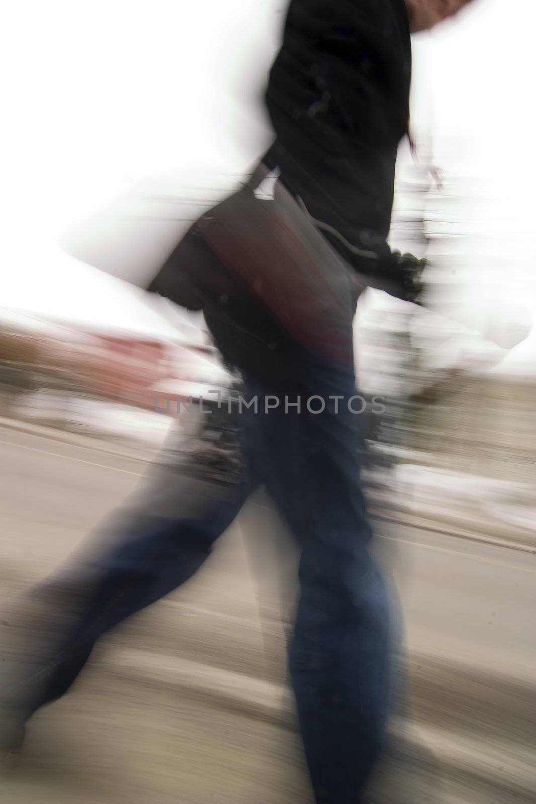 A motion blur abstract of a person walking in a hurry, a late rushing concept image.