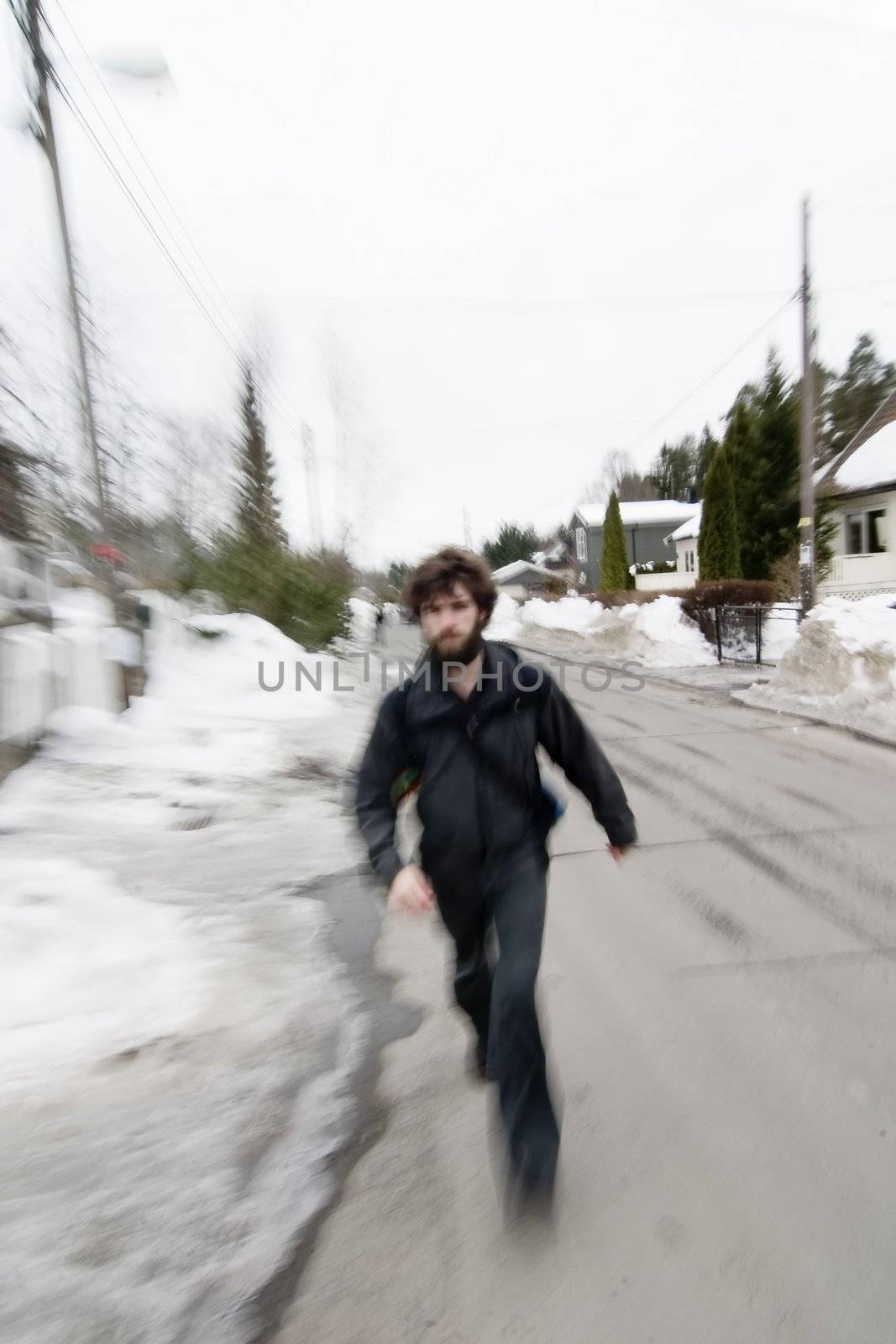 A motion blur abstract of a person walking in a hurry, a late rushing concept image.