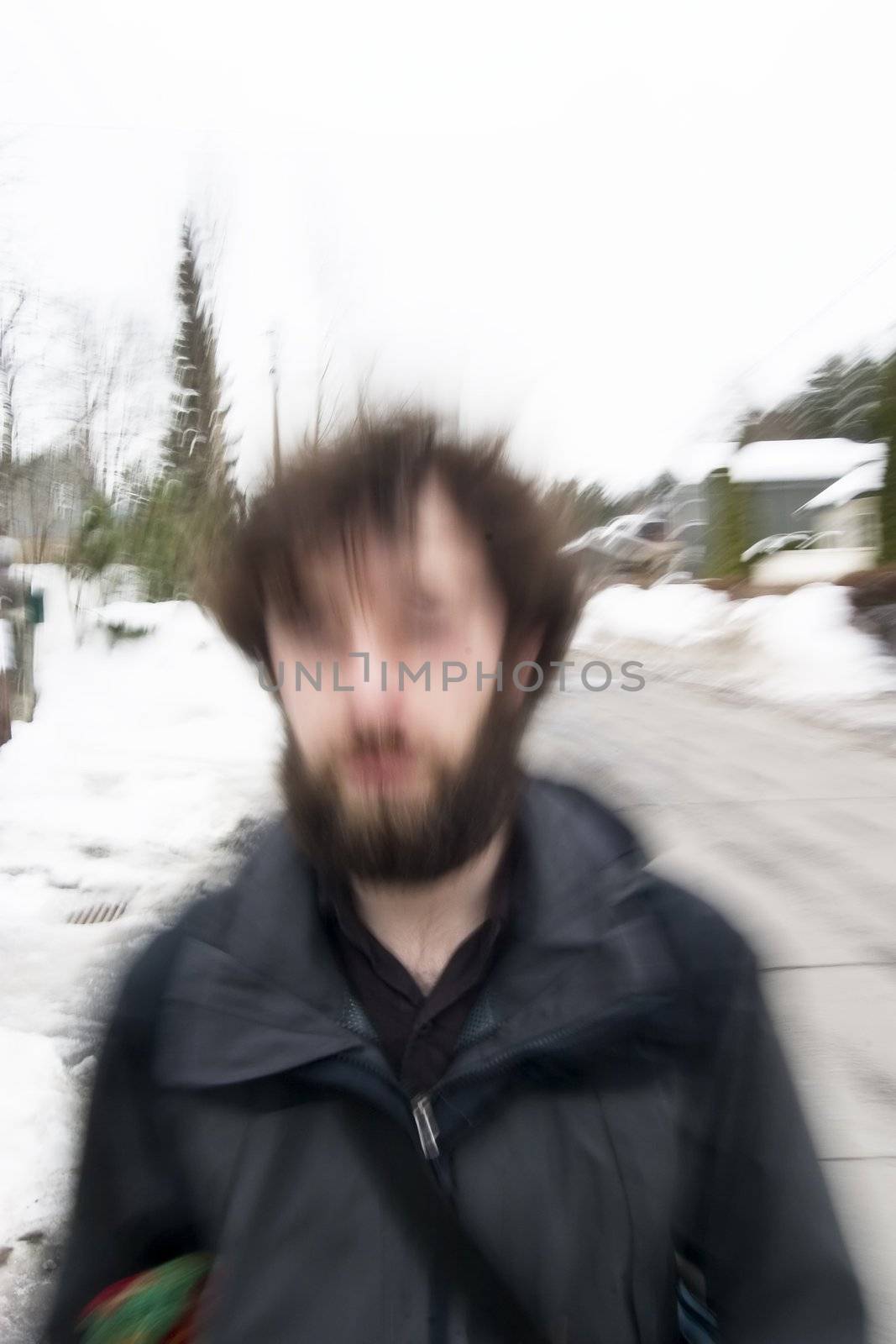 A motion blur abstract of a person walking in a hurry, a late stress rushing concept image.