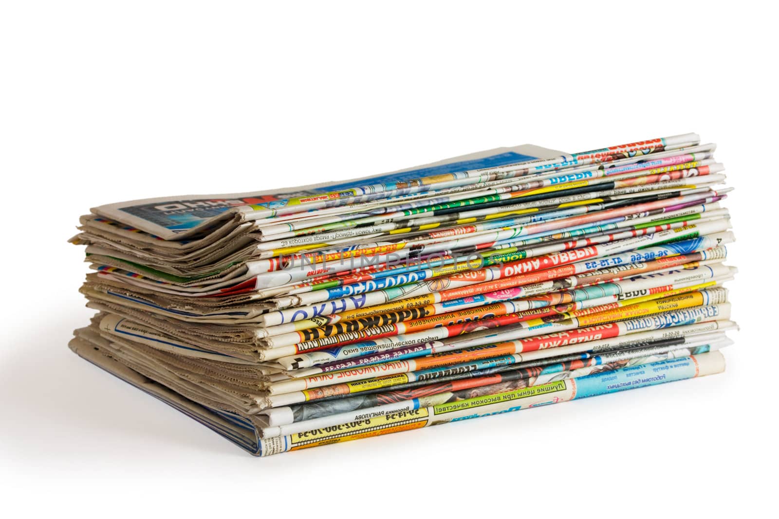 A pile of newspapers isolated on a white background