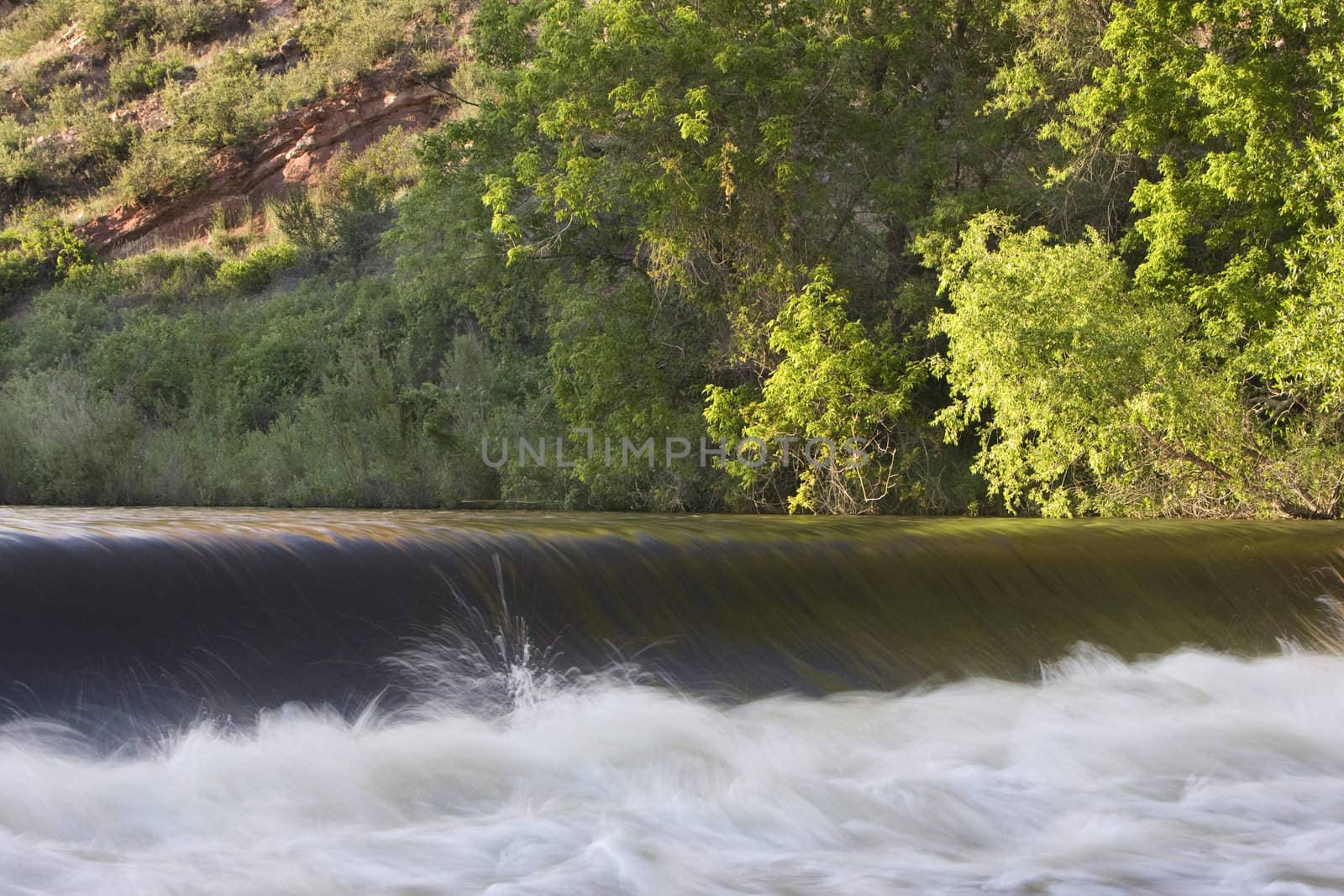 diversion dam taking water from river for farmland irrigation; Cache la Poudre River near Fort Collins, Colorado