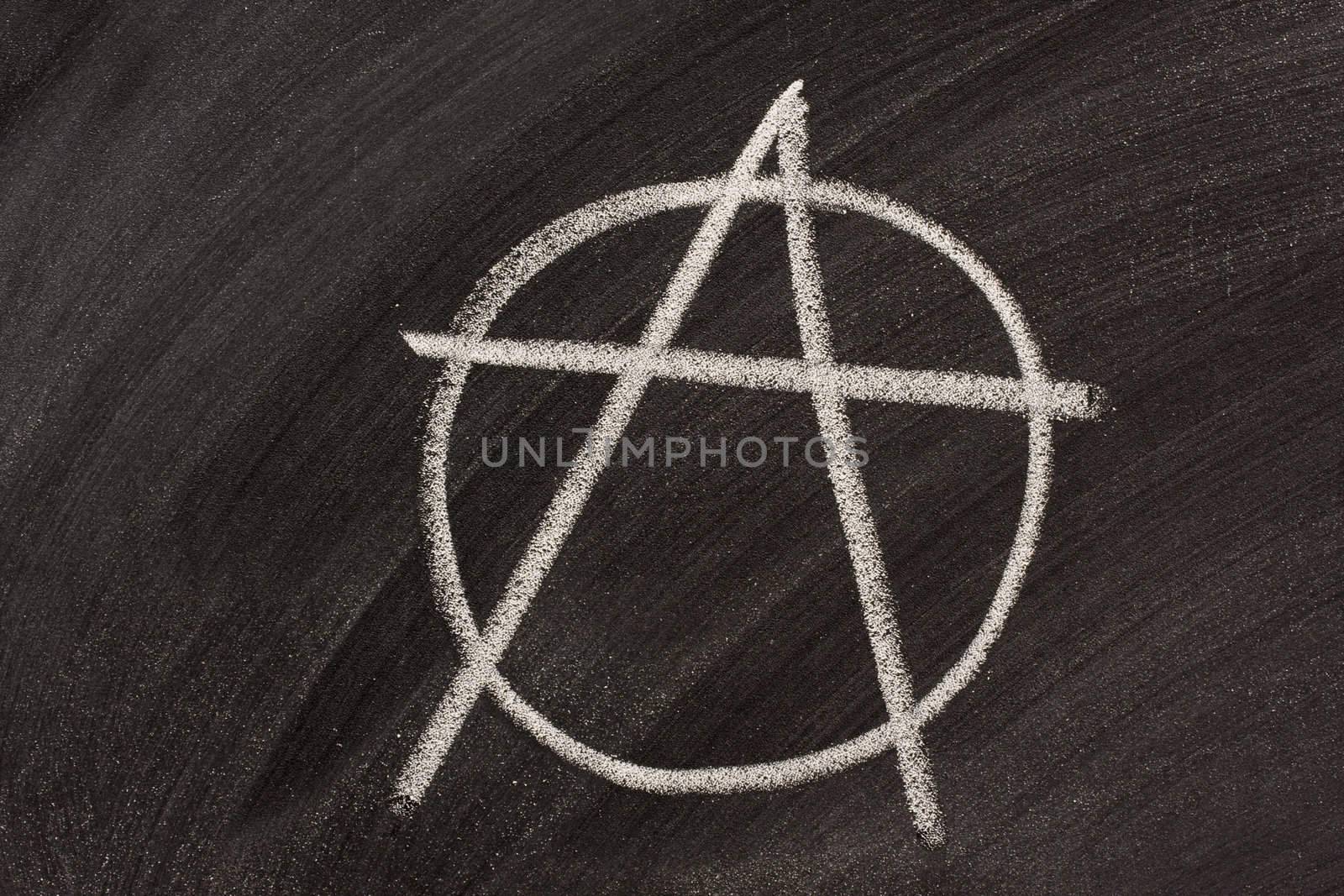 anarchy symbol on a blackboard by PixelsAway