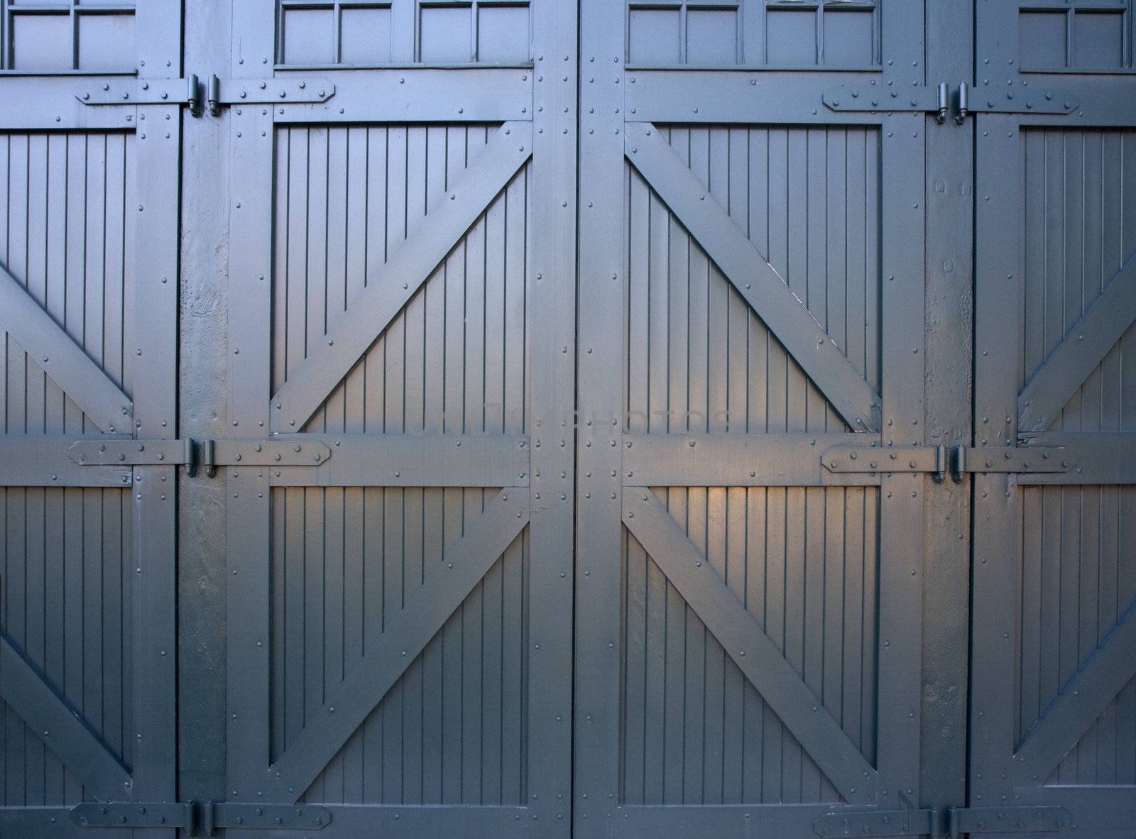 heavy wooden doors to industrial building by PixelsAway