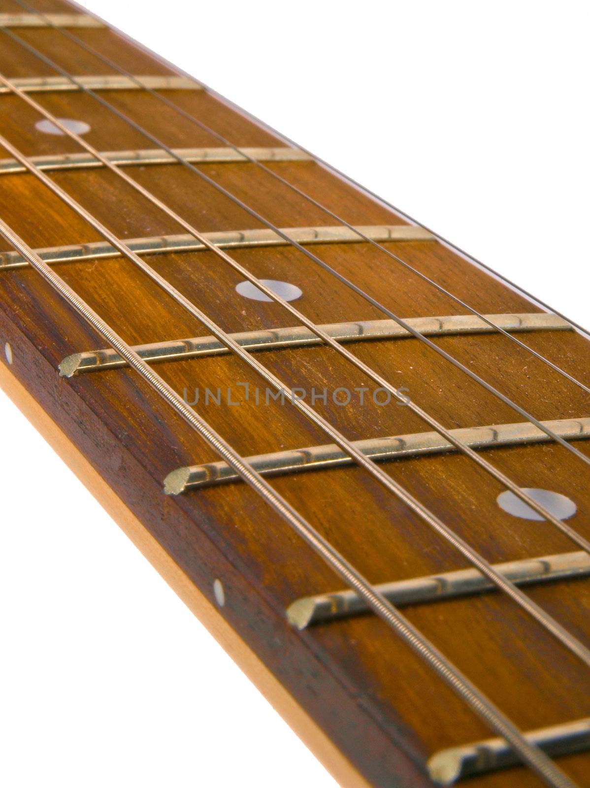 guitar neck with strings. Close up on white background