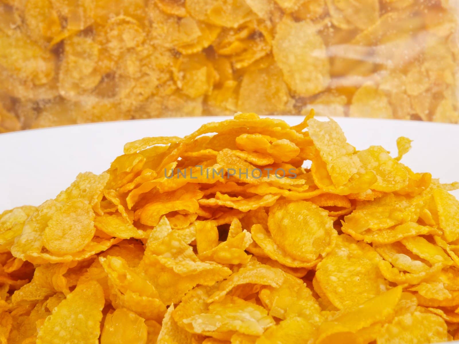 cornflakes in a bowl. Close up by dotweb