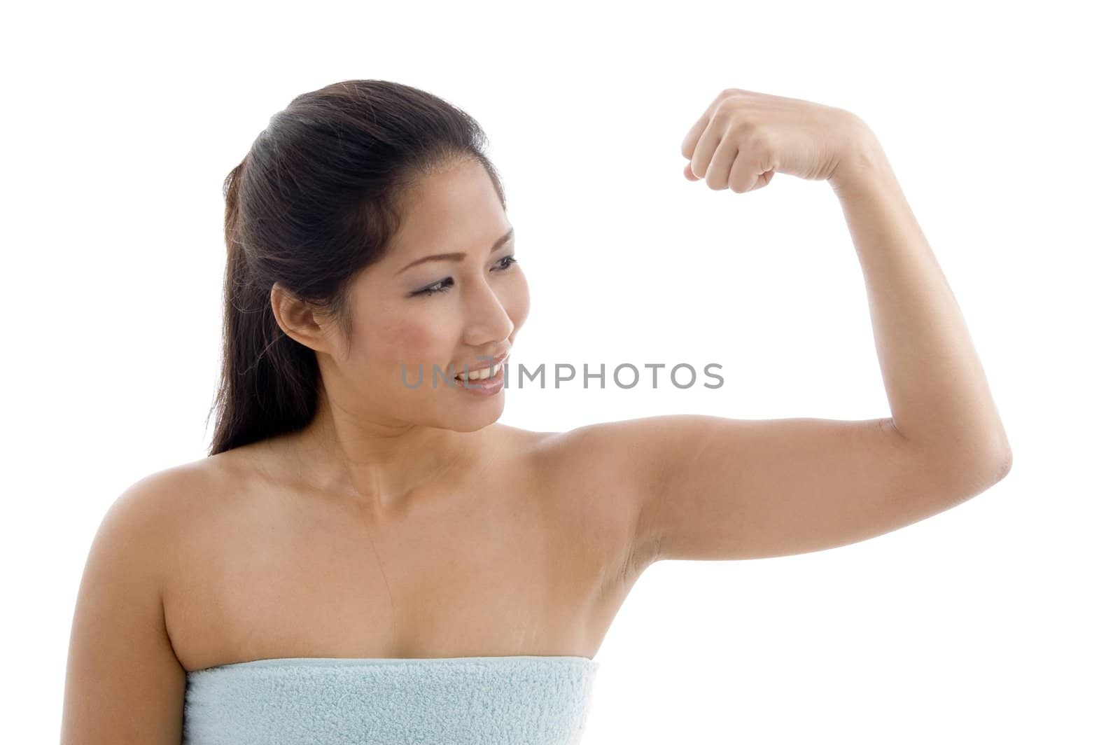 portrait of young female in towel with white background