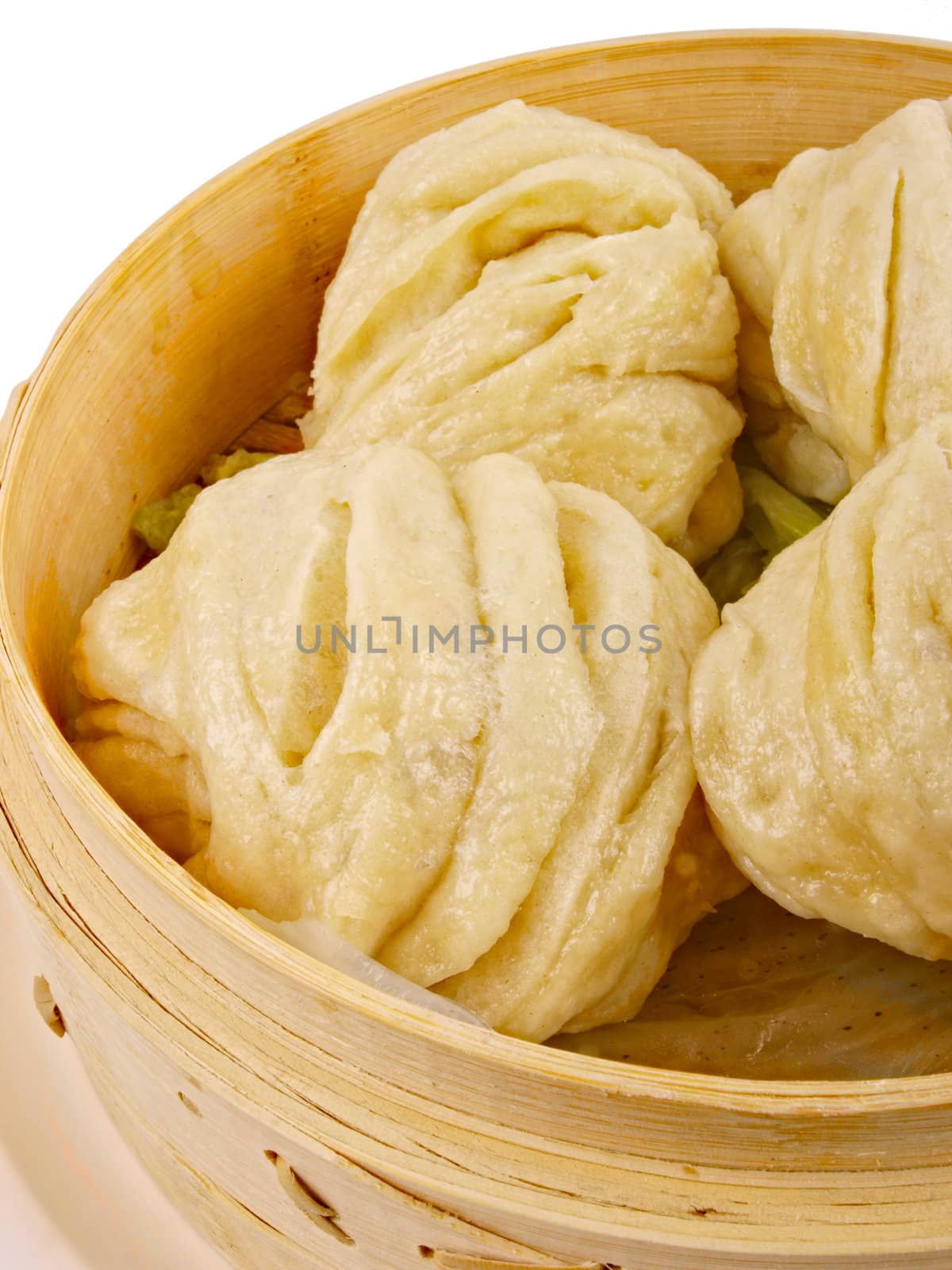 Chinese steamed roll. Close up on white background