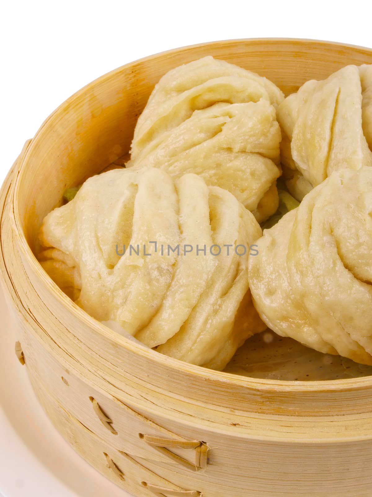 Chinese steamed roll. Close up on white background