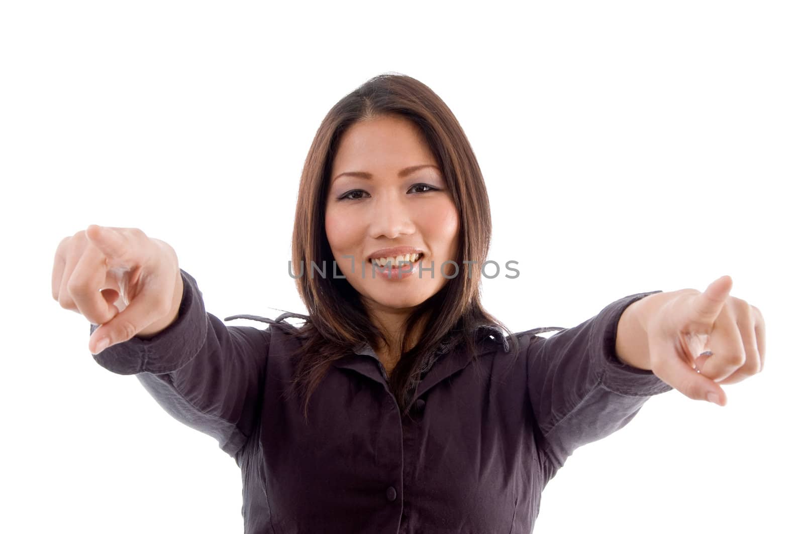 young woman pointing with both hands on an isolated background