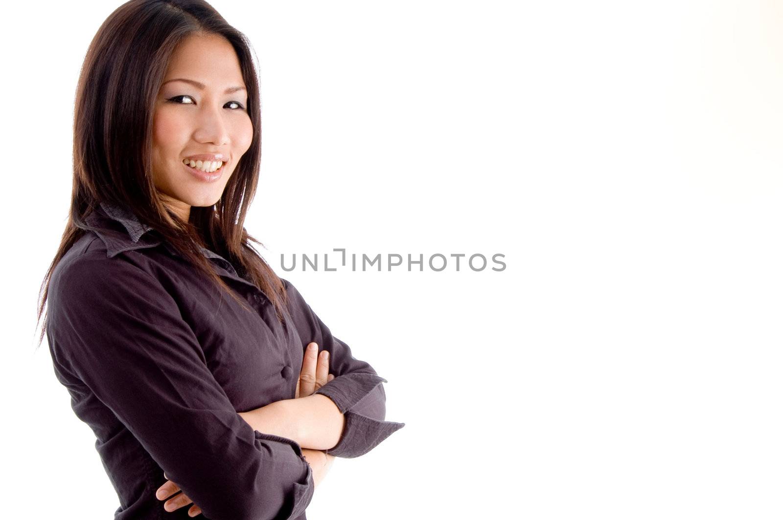 side pose of woman with folded hands on an isolated background