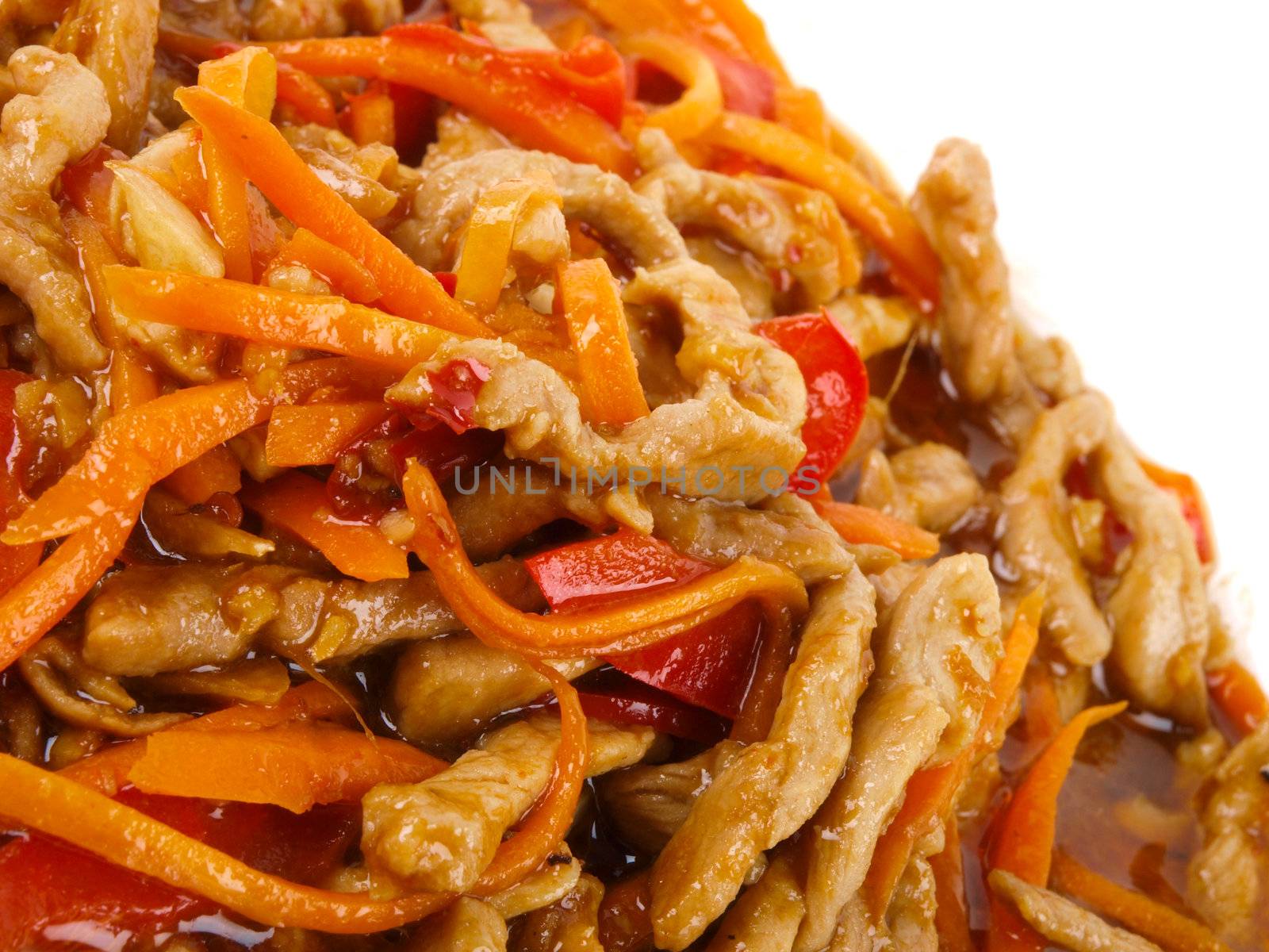 Chinese fried pork meat with pepper and carrot