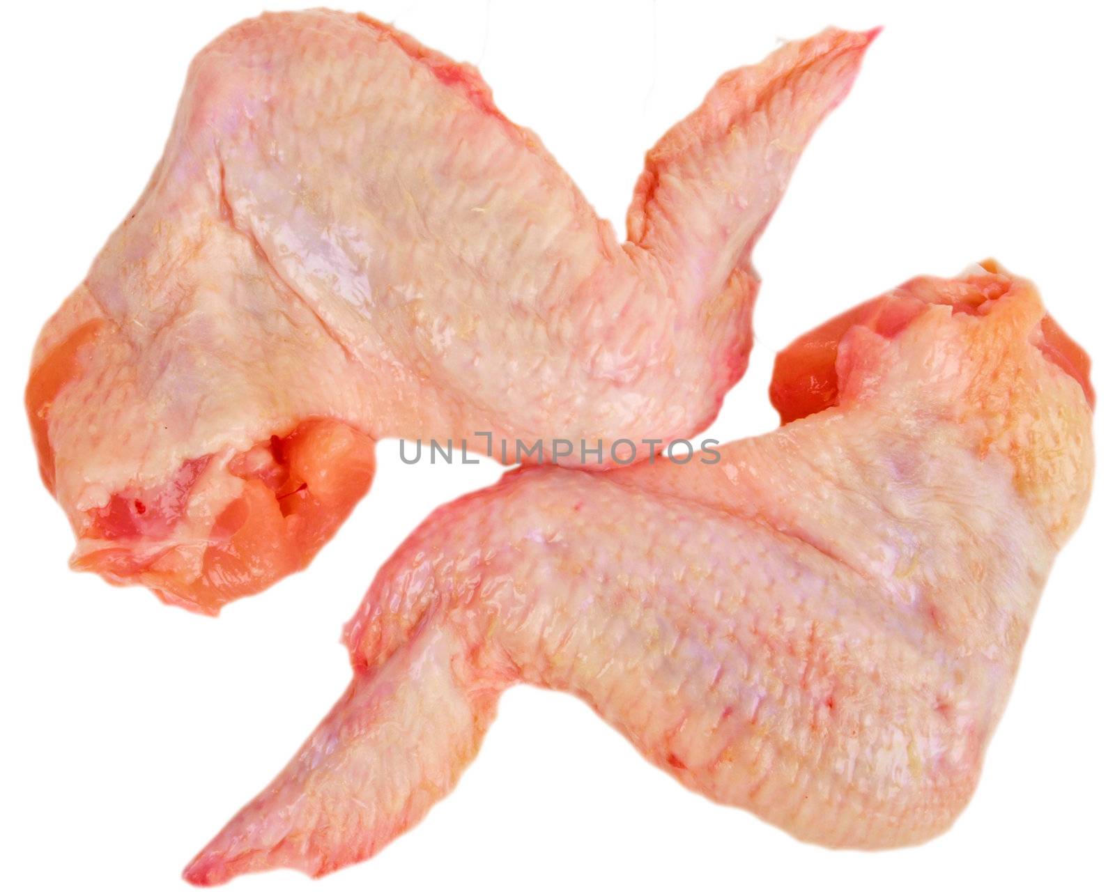 Fresh raw chicken wings. Close up on white background by dotweb