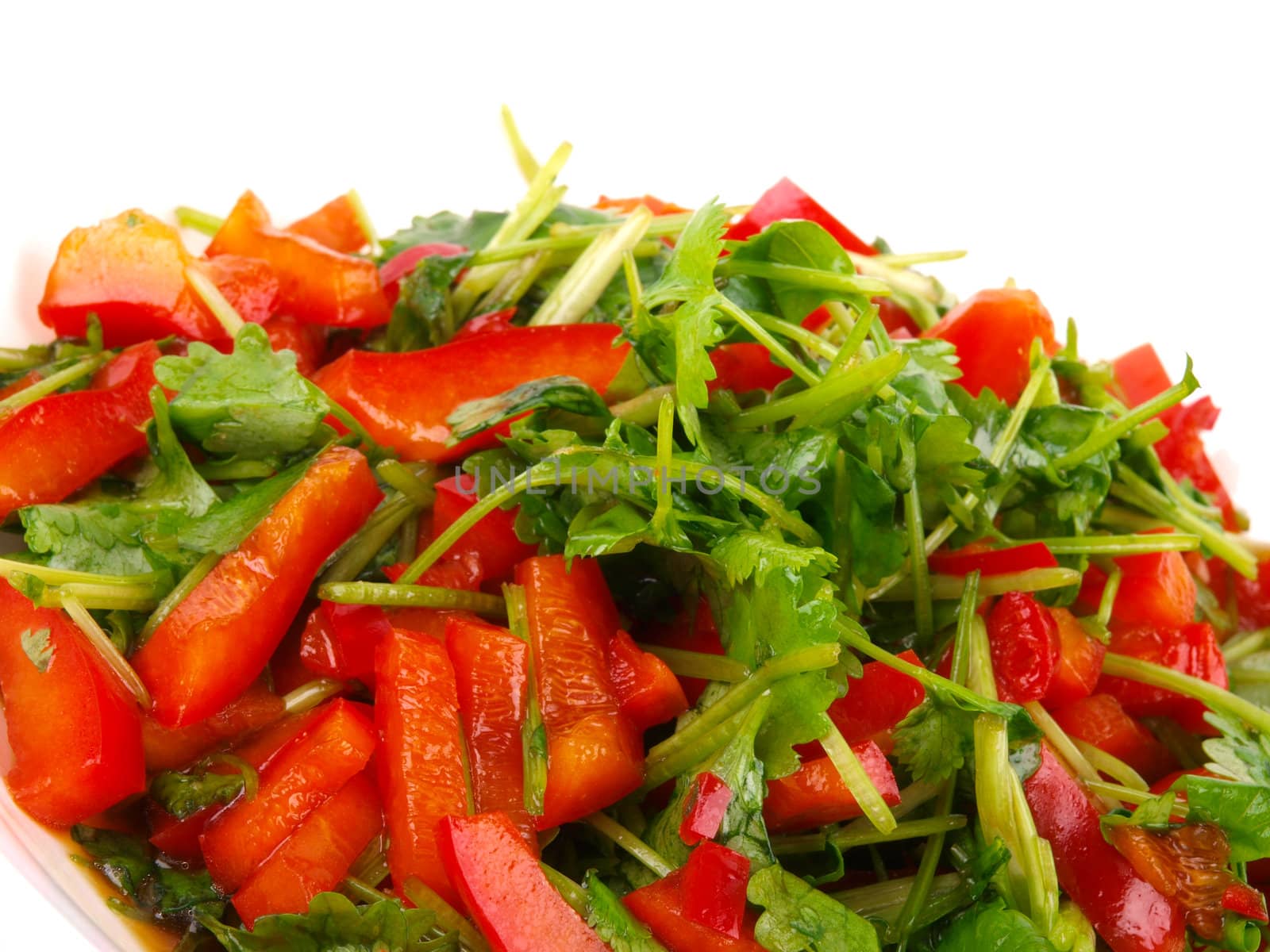 Fresh Coriander and sweet pepper salad. Close up 