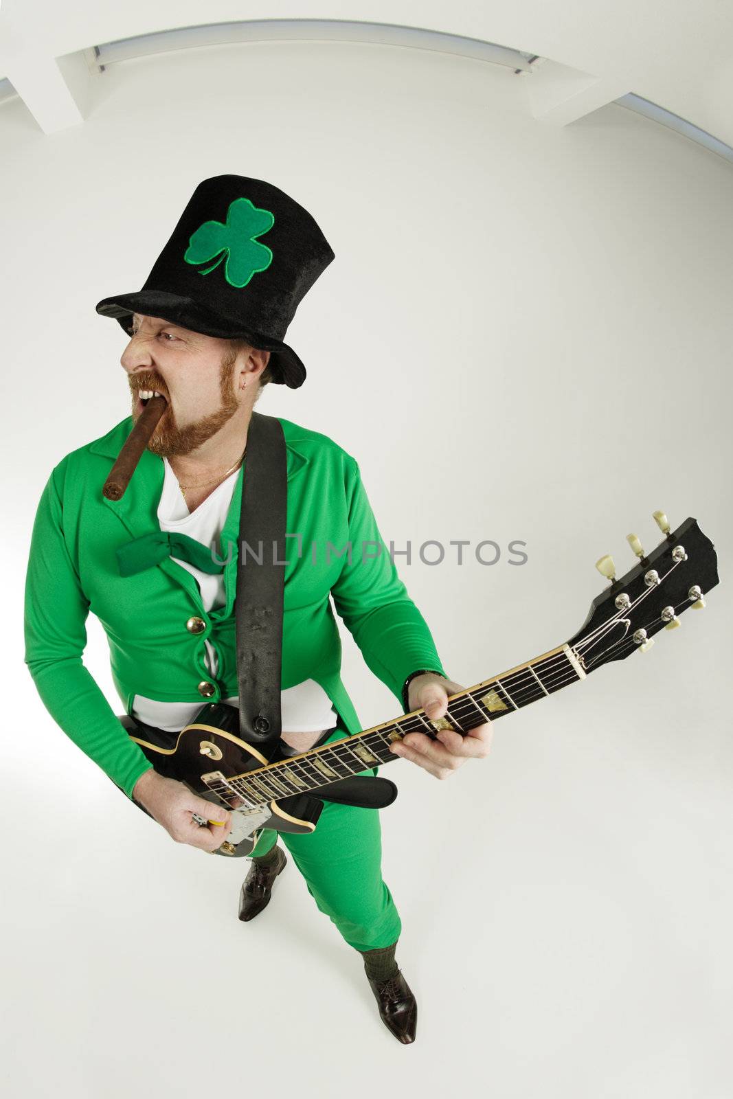 An image of a Leprechaun playing electric guitar.
