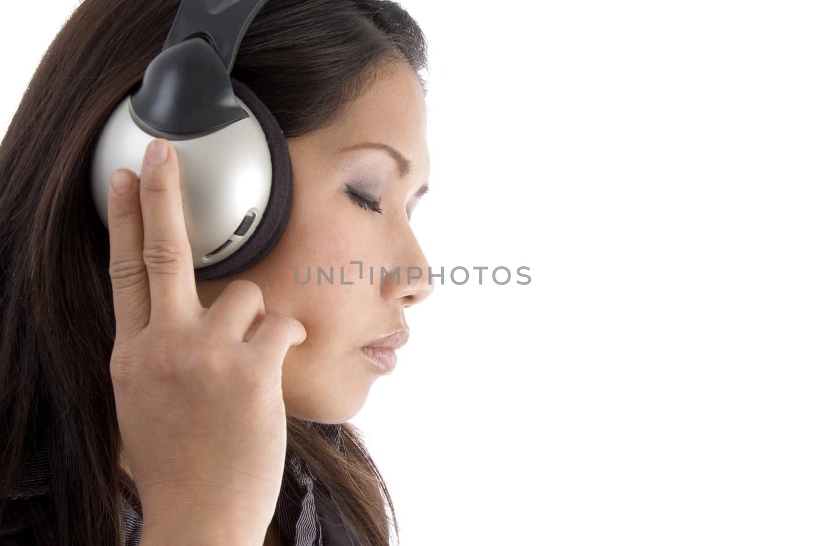 asian, chinese, japanese, korean, asian pacific, thai  woman concentrating on music against white background