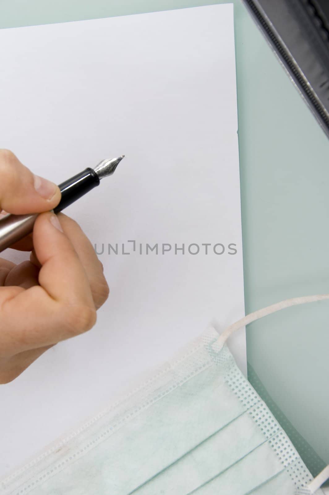 close up of pen and writing paper