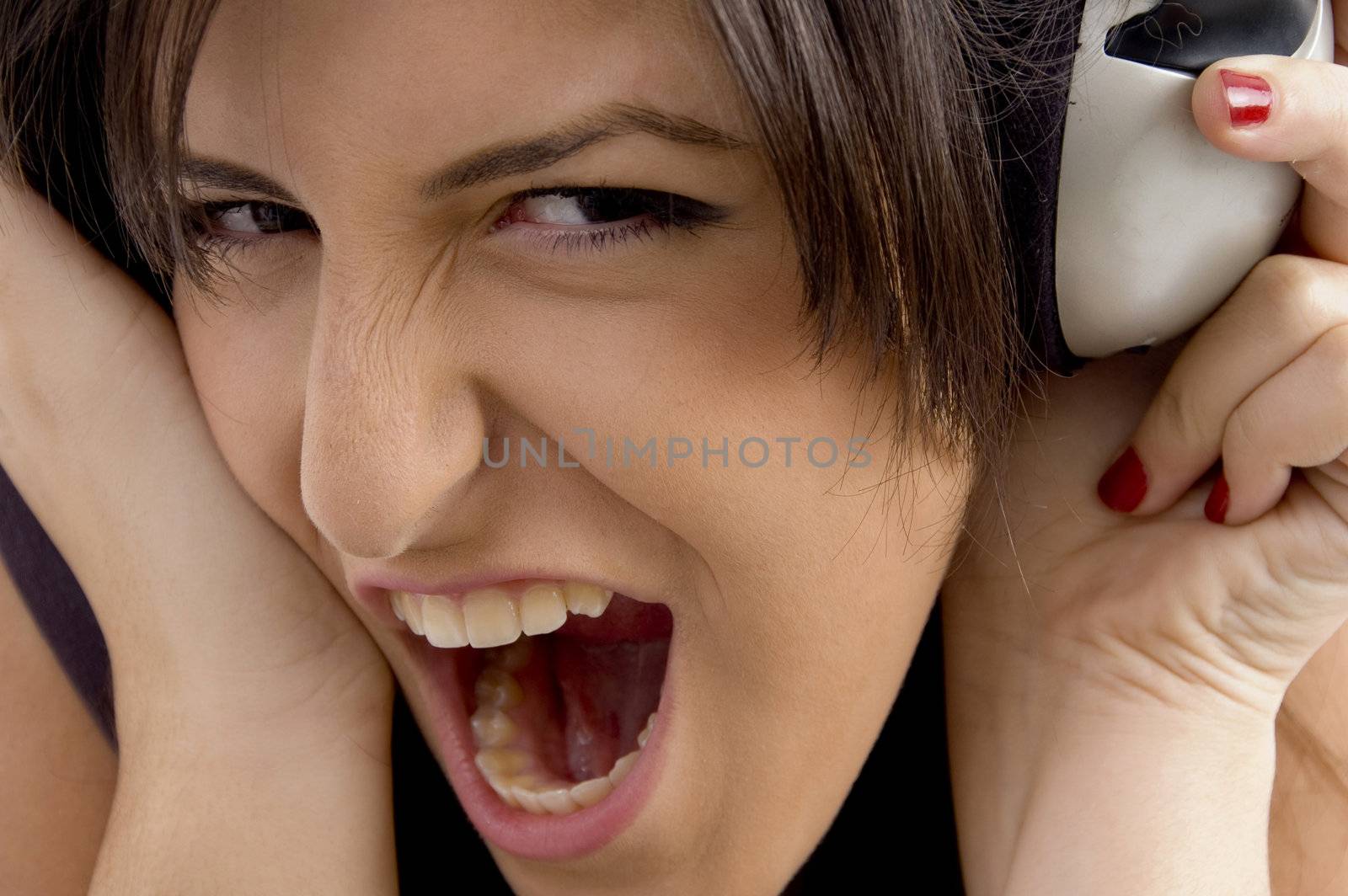 young woman crazy about music on an isolated white background
