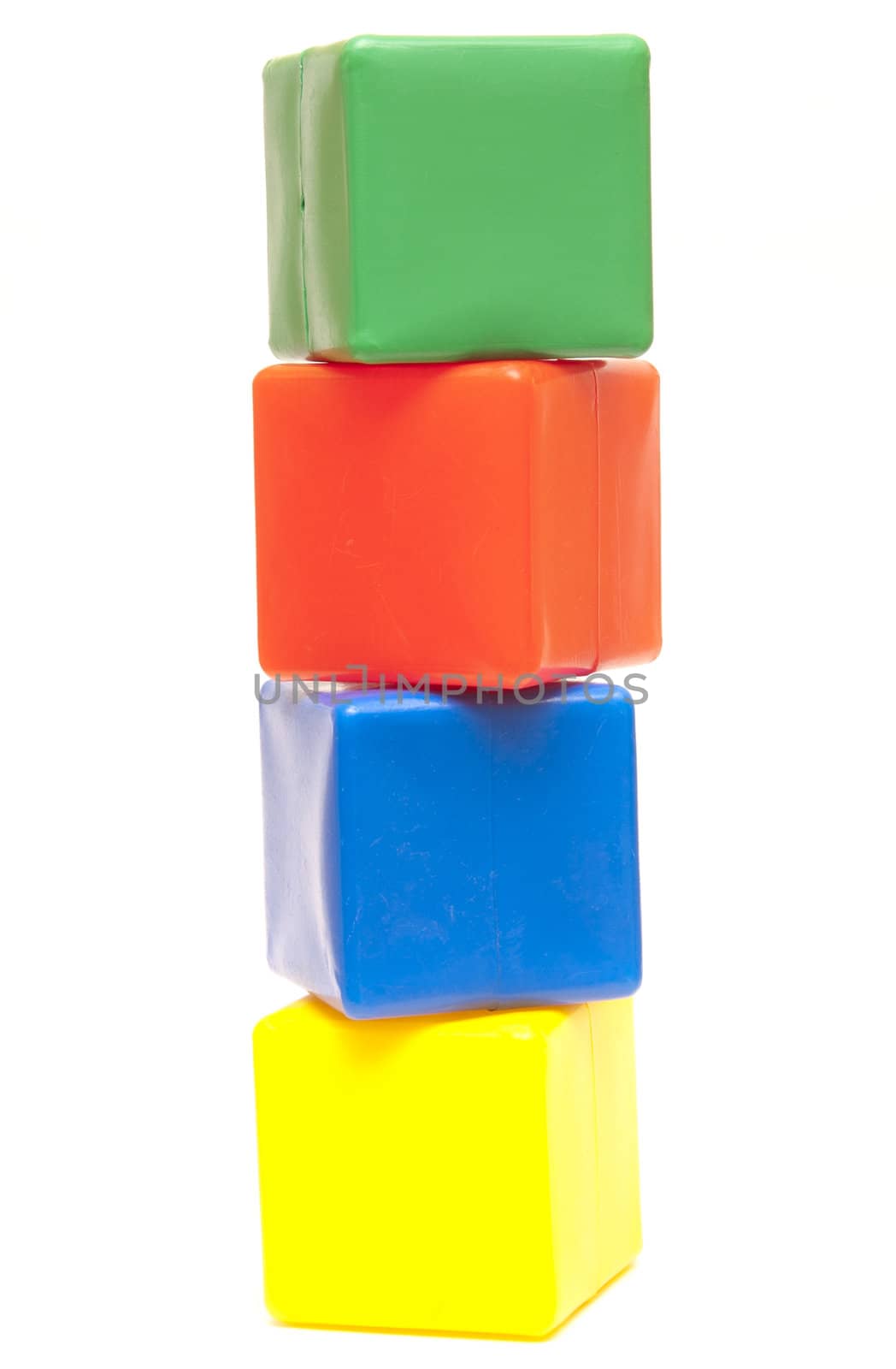 colored childrens cubes on a white background 