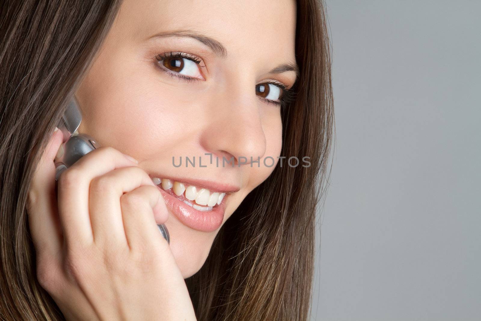 Beautiful smiling telephone girl closeup