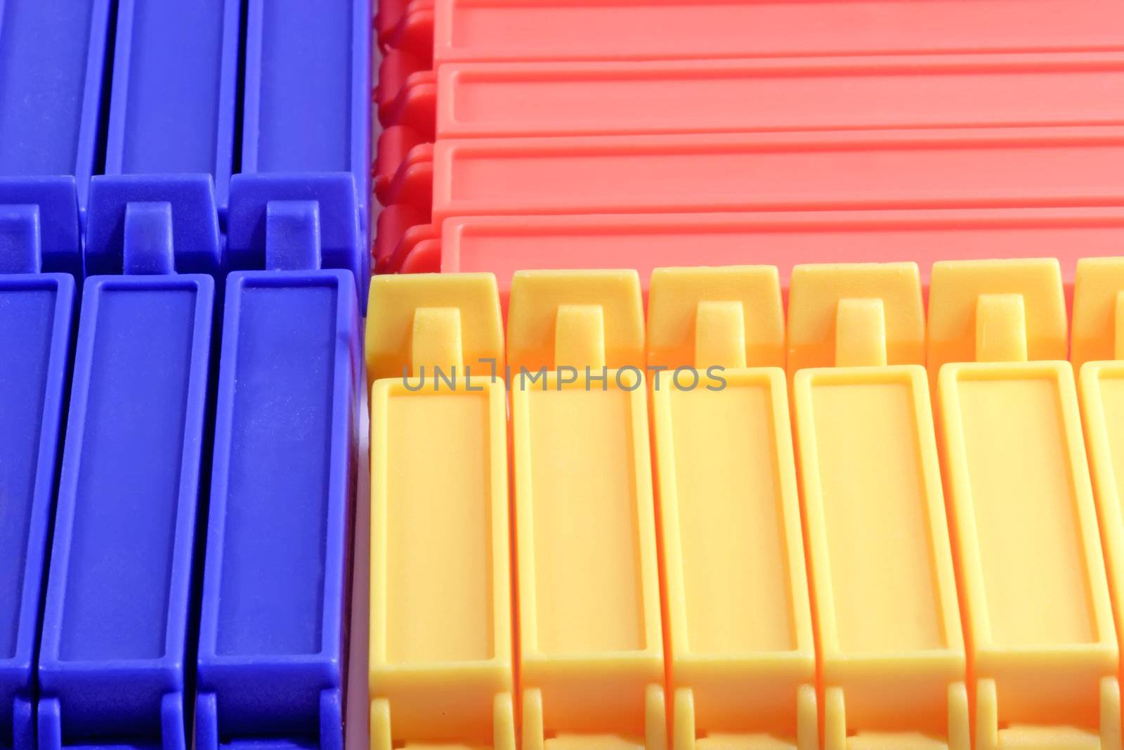 Blue yellow and red kitchen clips in rows