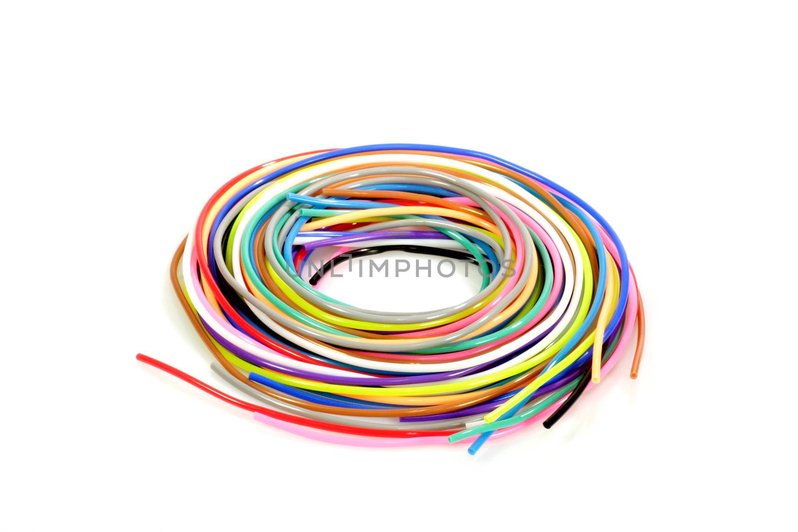 Colorful plastic bands on white background