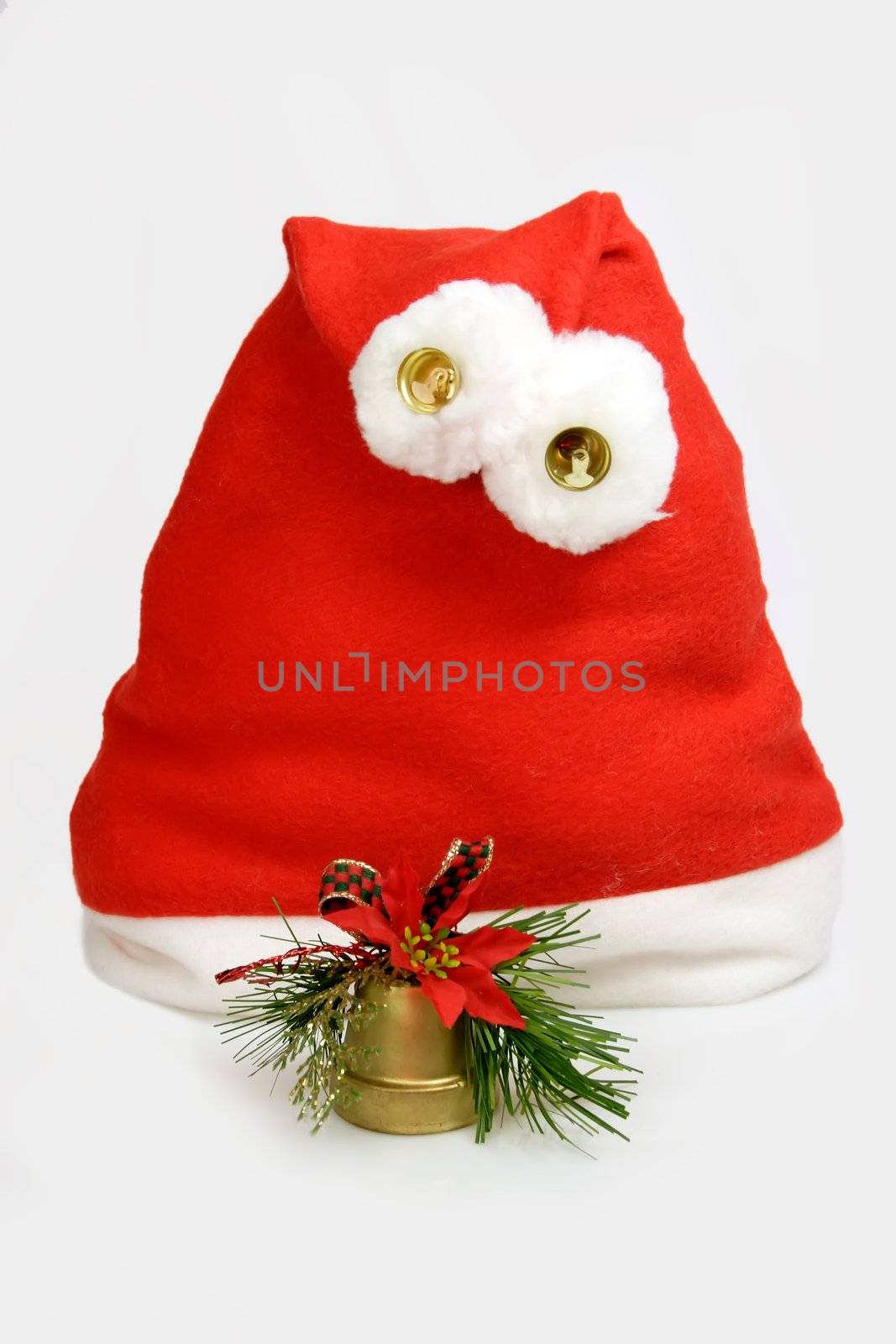 Santa hat with bell on light background