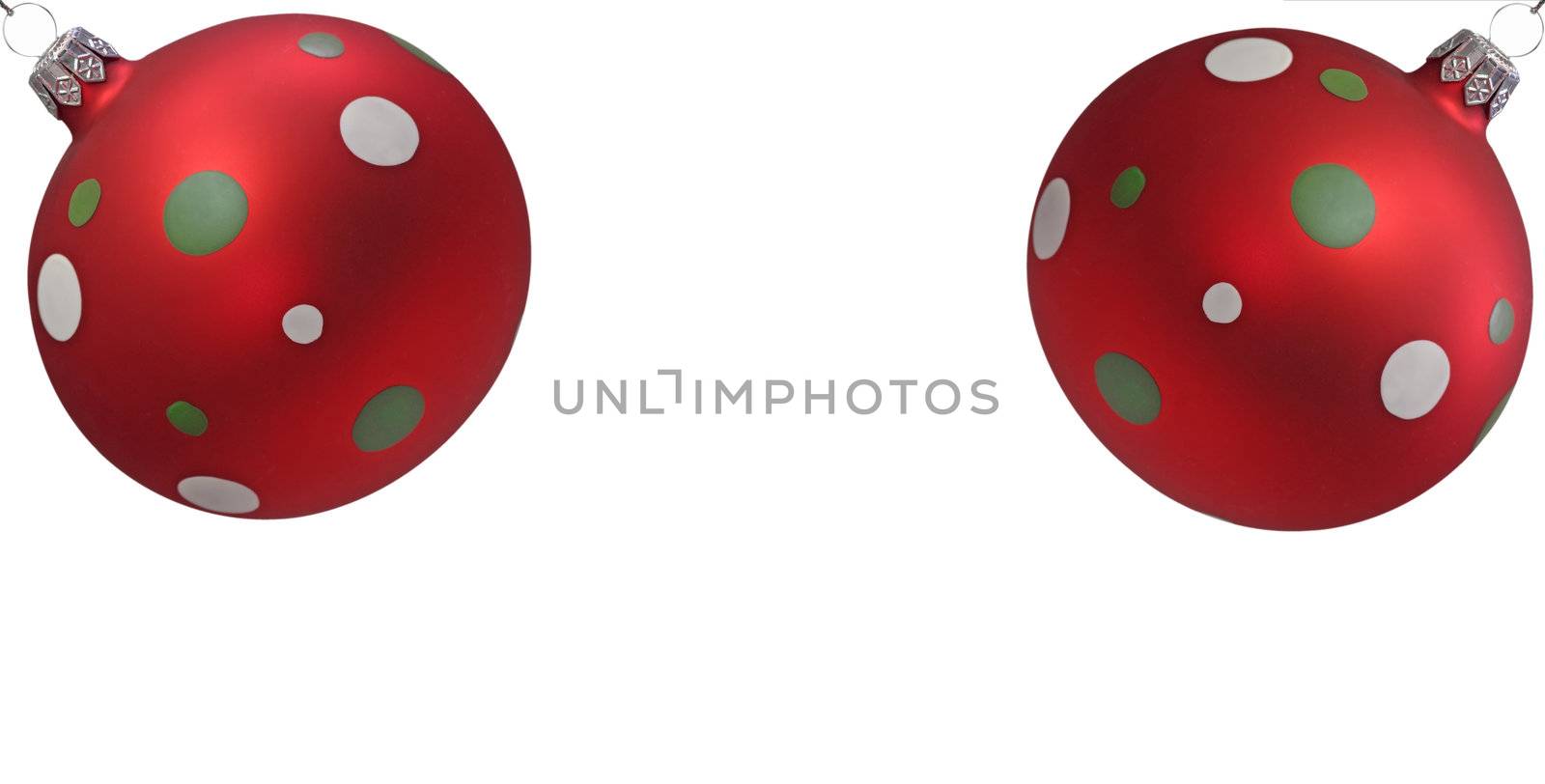 Two red christmas tree balls with spots, isolated on white background