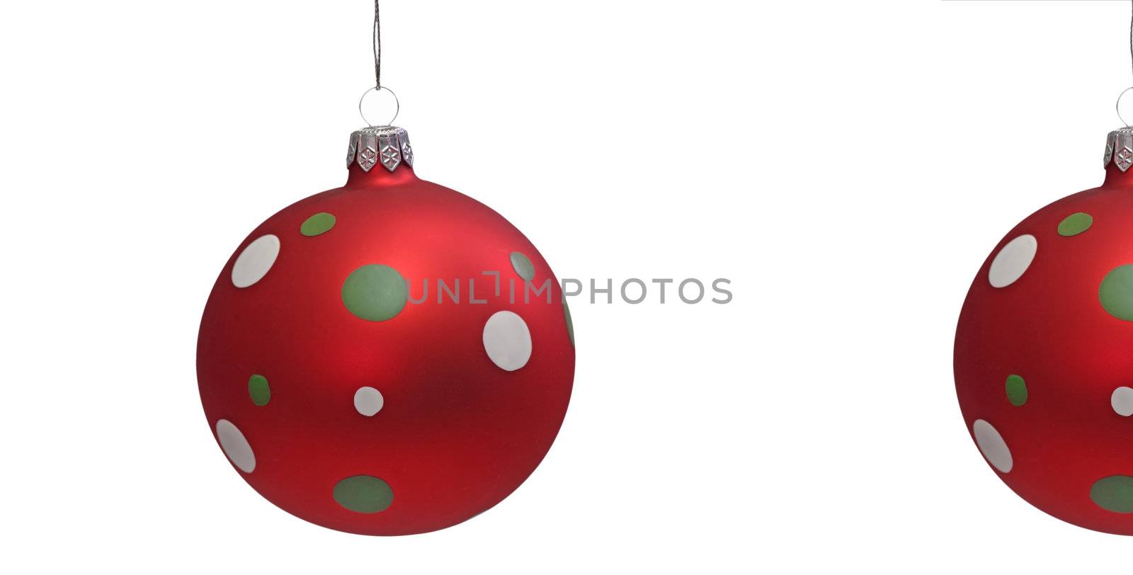 Red christmas tree balls with spots, isolated on white background
