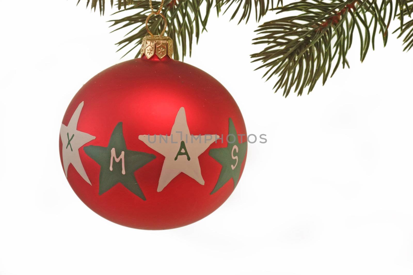 Red christmas tree ball hanging on a fir branch