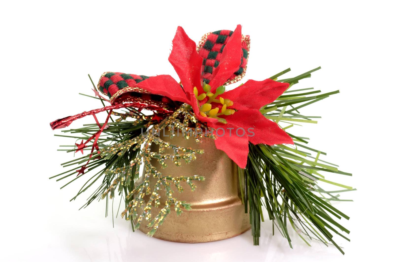 Close up of a golden christmas bell on bright background
