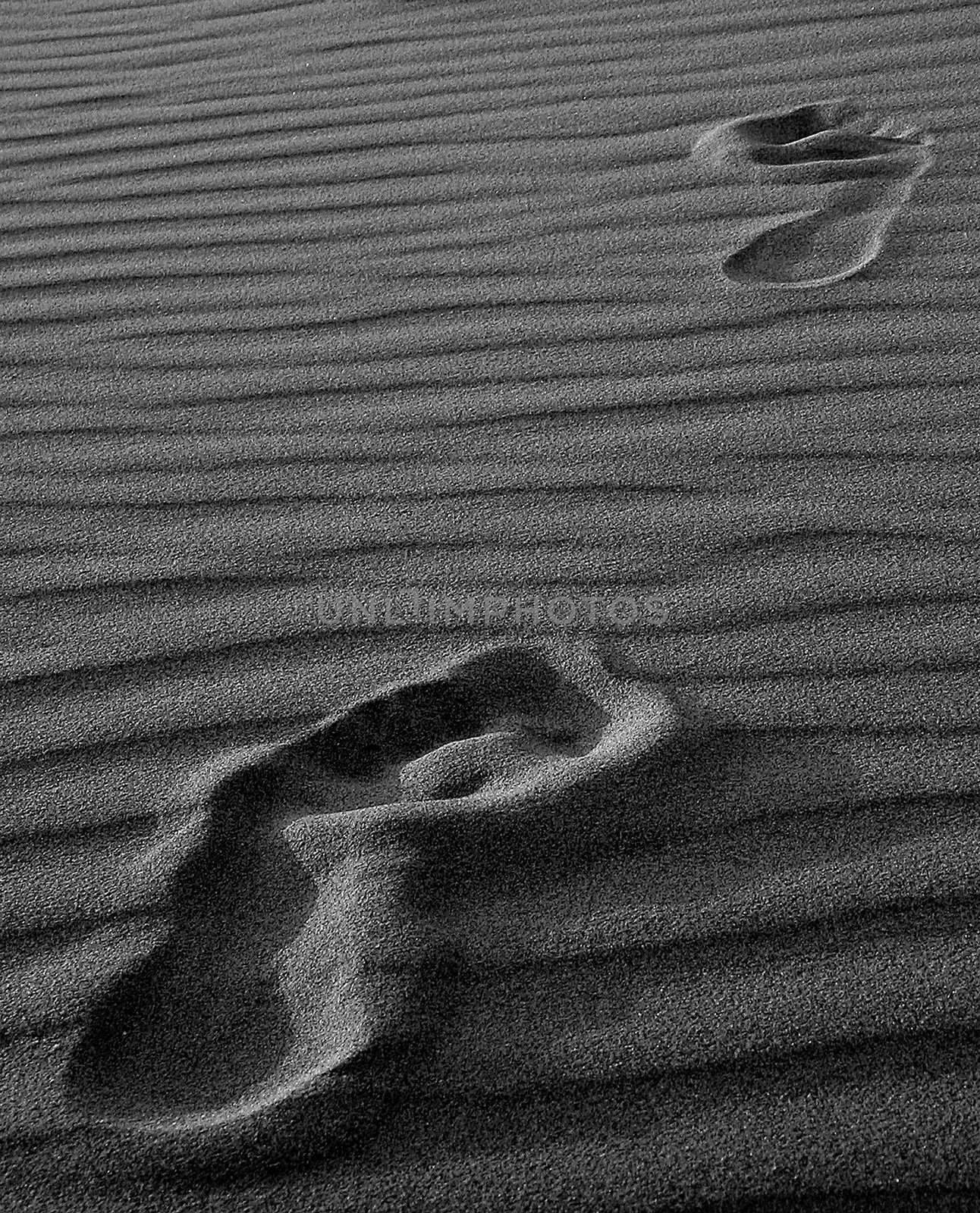 Step marks in the sand