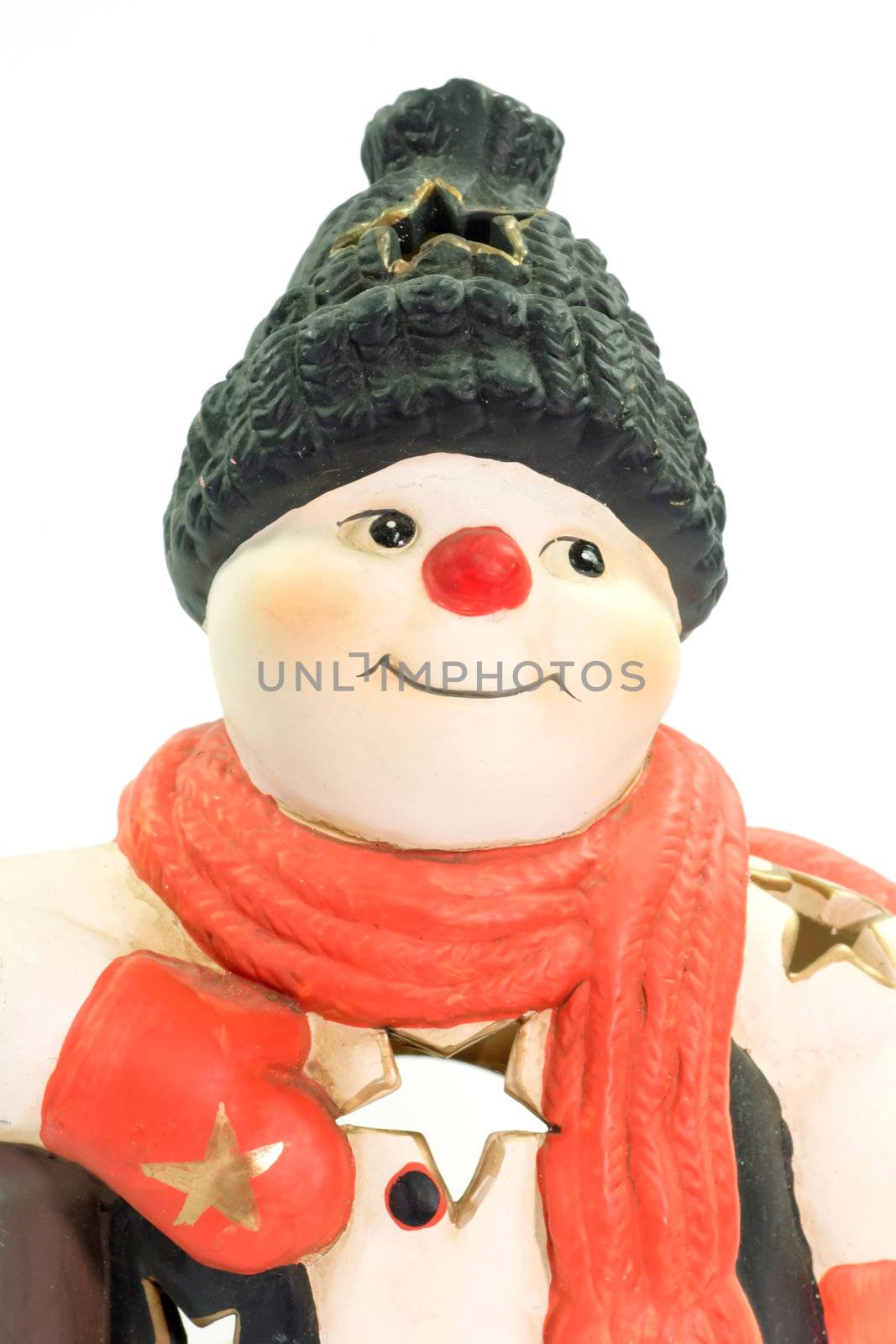 Close up of a snowman figurine on bright background