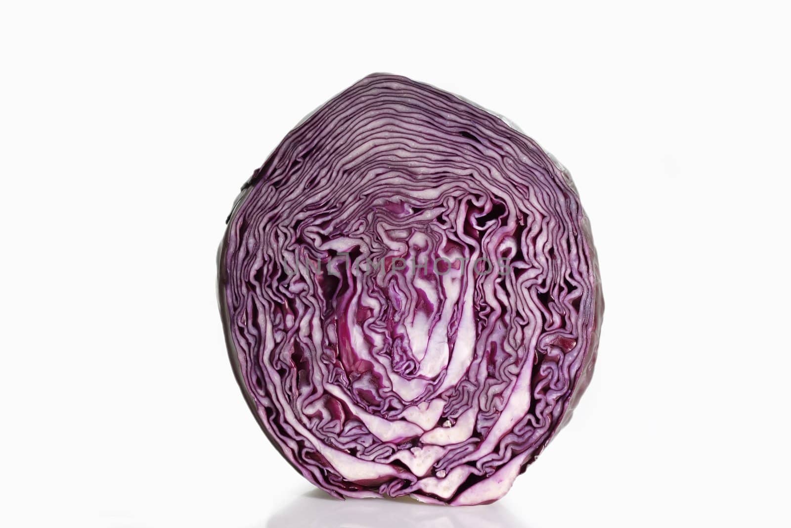Sliced red cabbage on light background