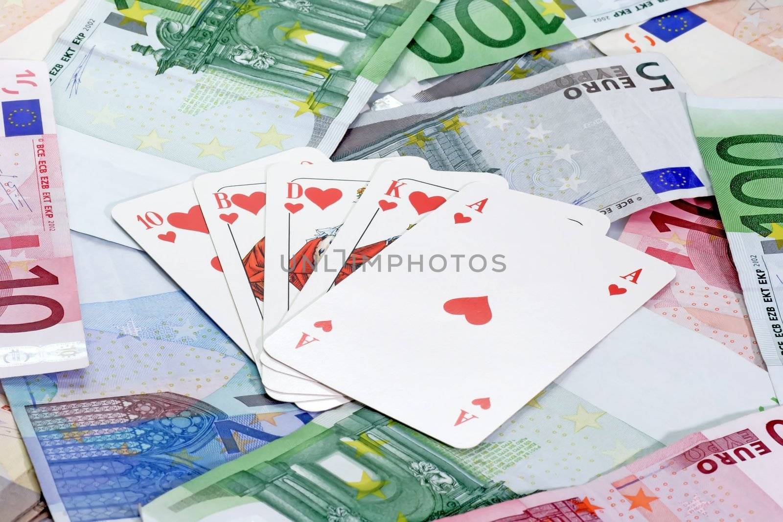 Poker cards on euro notes