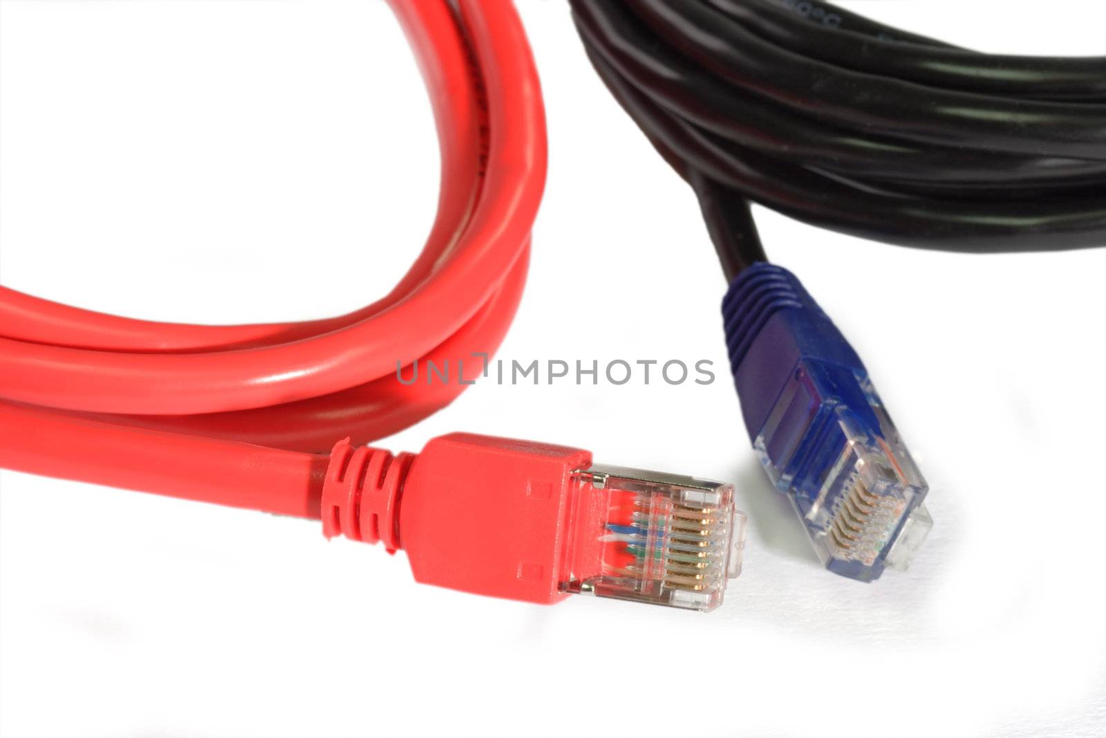 Two network cables on light background